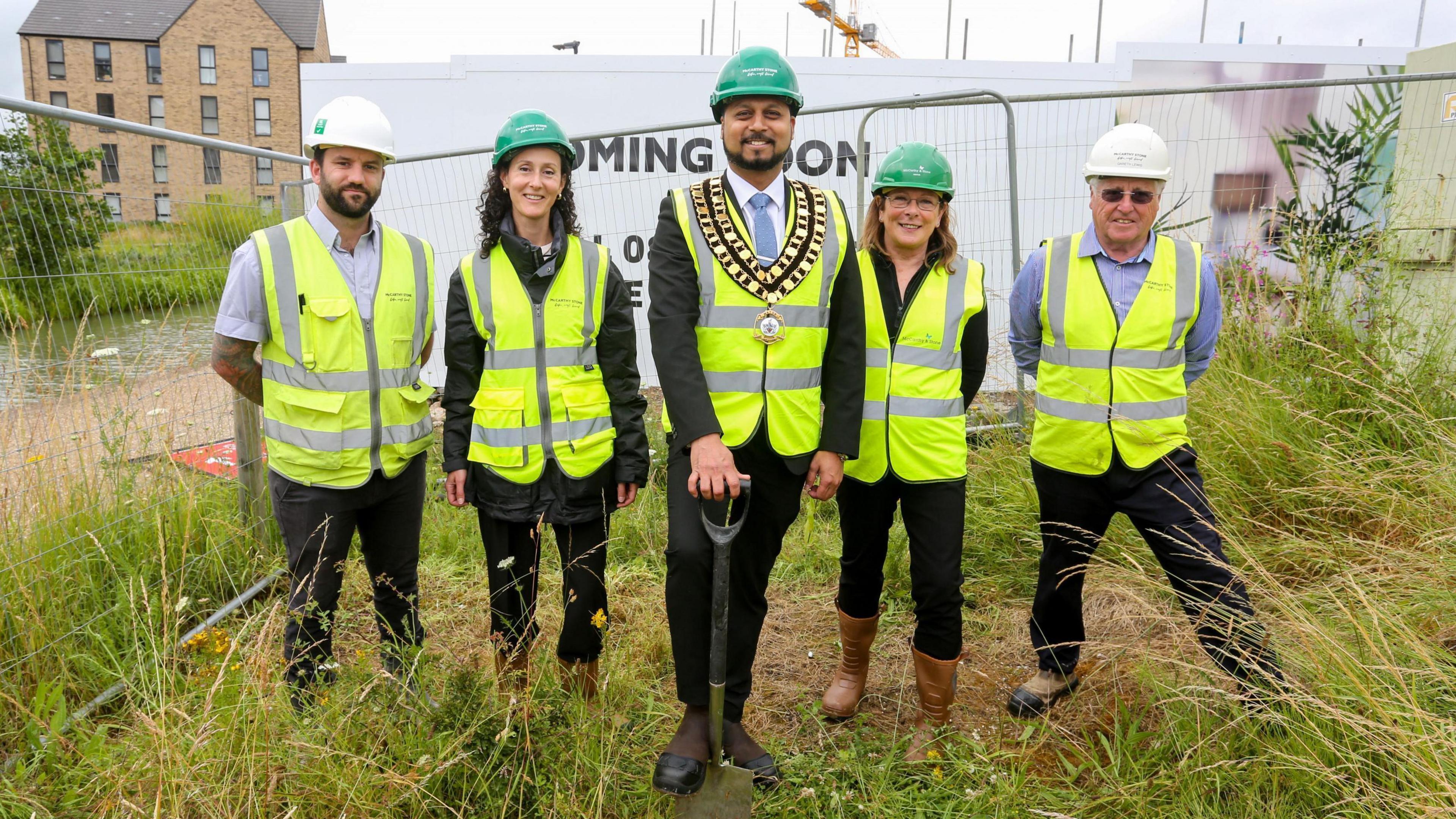 Mayor of Swindon Imtiyaz Shaikh puts a spade in the ground at new Wichelstowe development