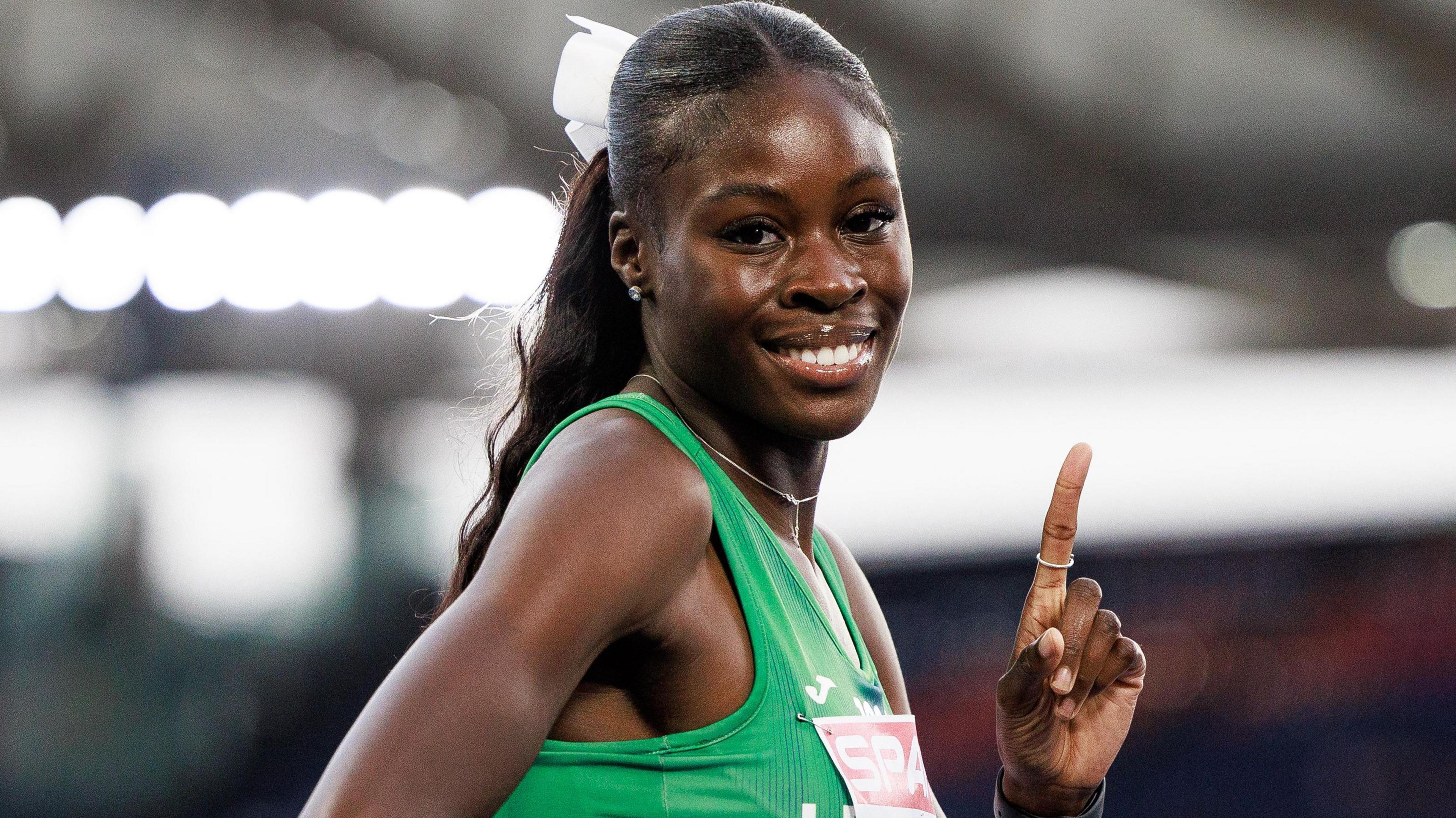 Rhasidat Adeleke looks happy after winning her semi-final in Rome on Sunday night