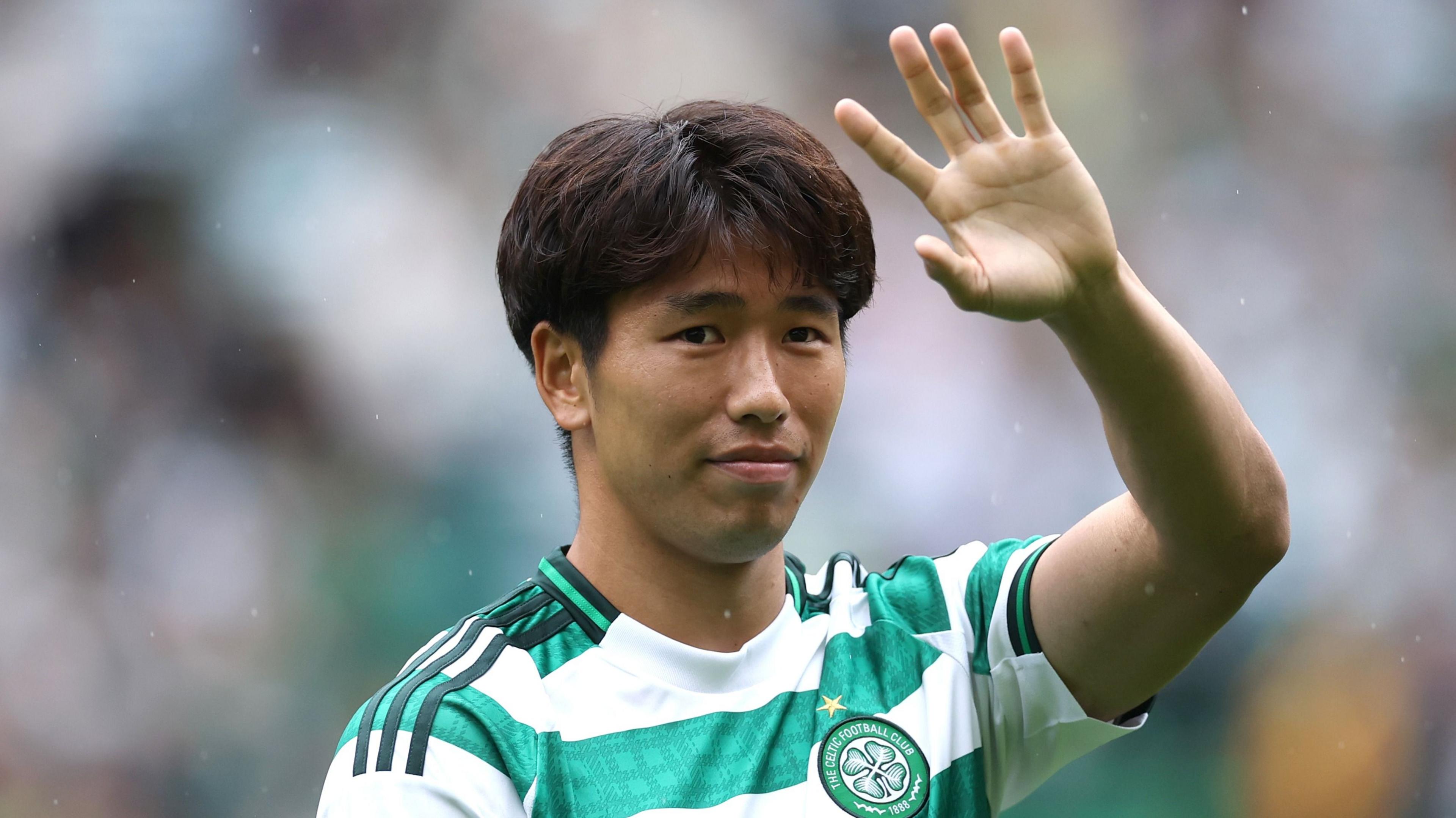 Shin Yamada waves to Celtic fans