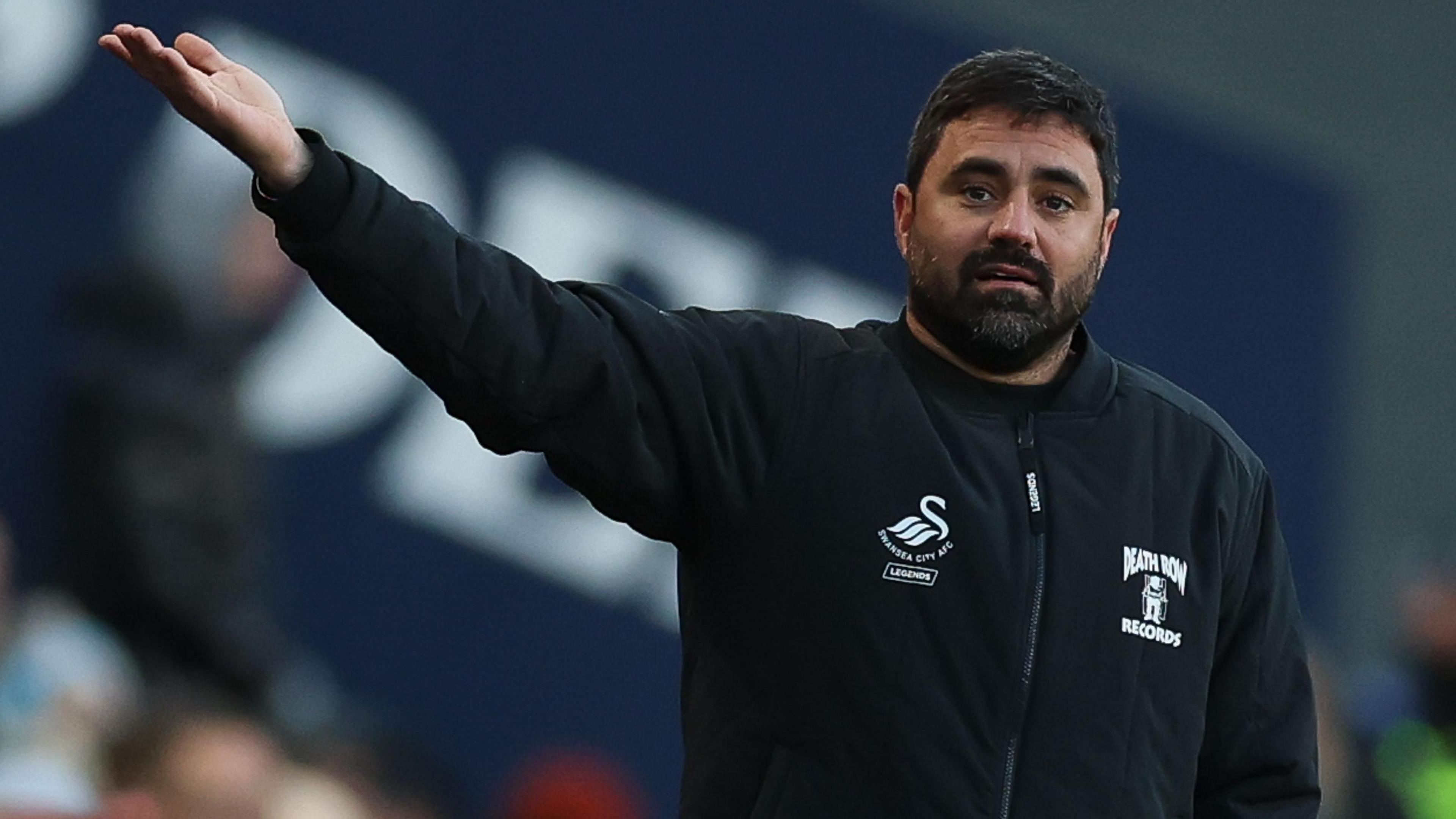 Vitor Matos gestures to his players on the touchline 