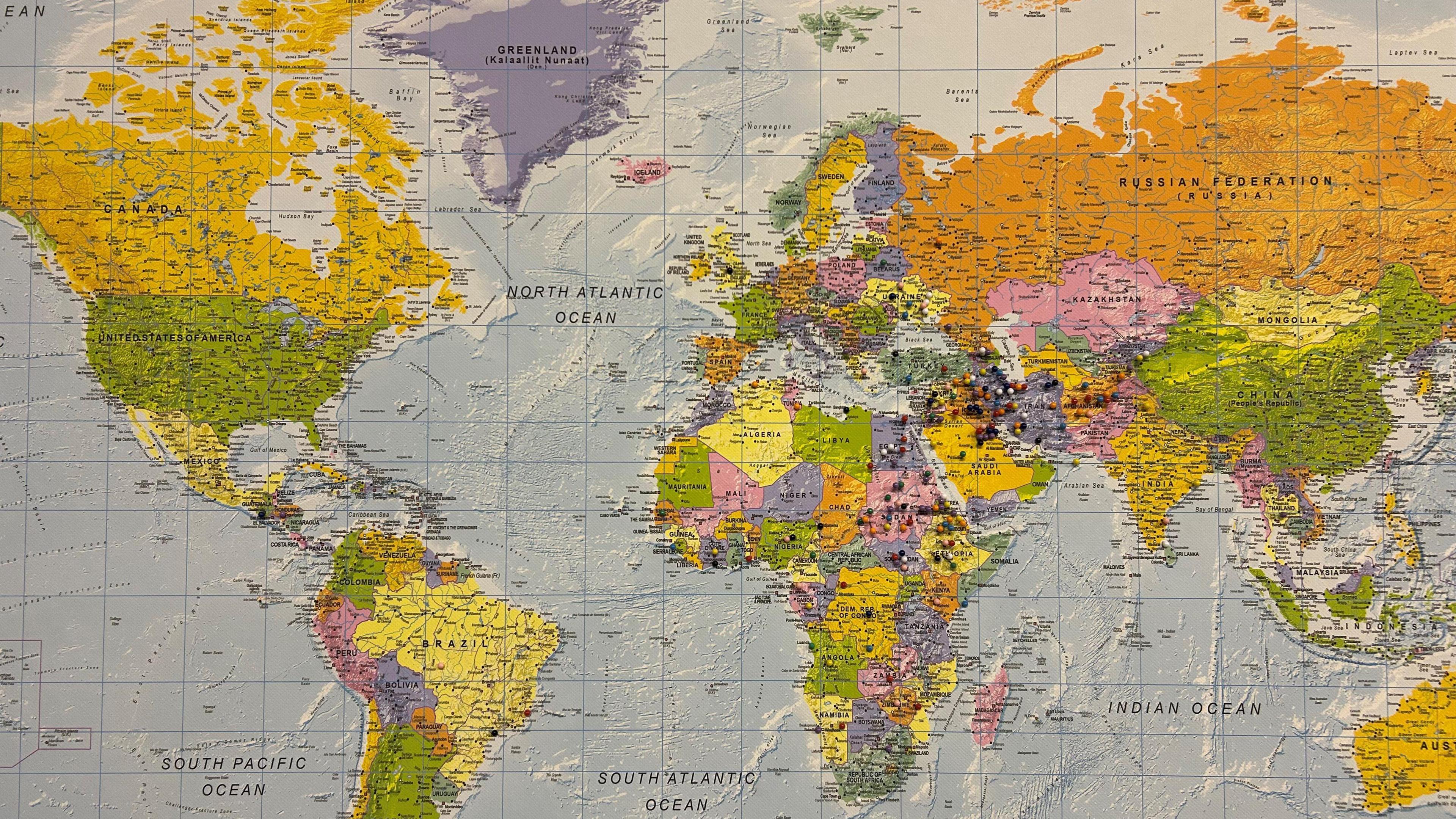 A map of the world which has pins placed on some of the countries, with most of the pins placed on the Middle East and north Africa. 