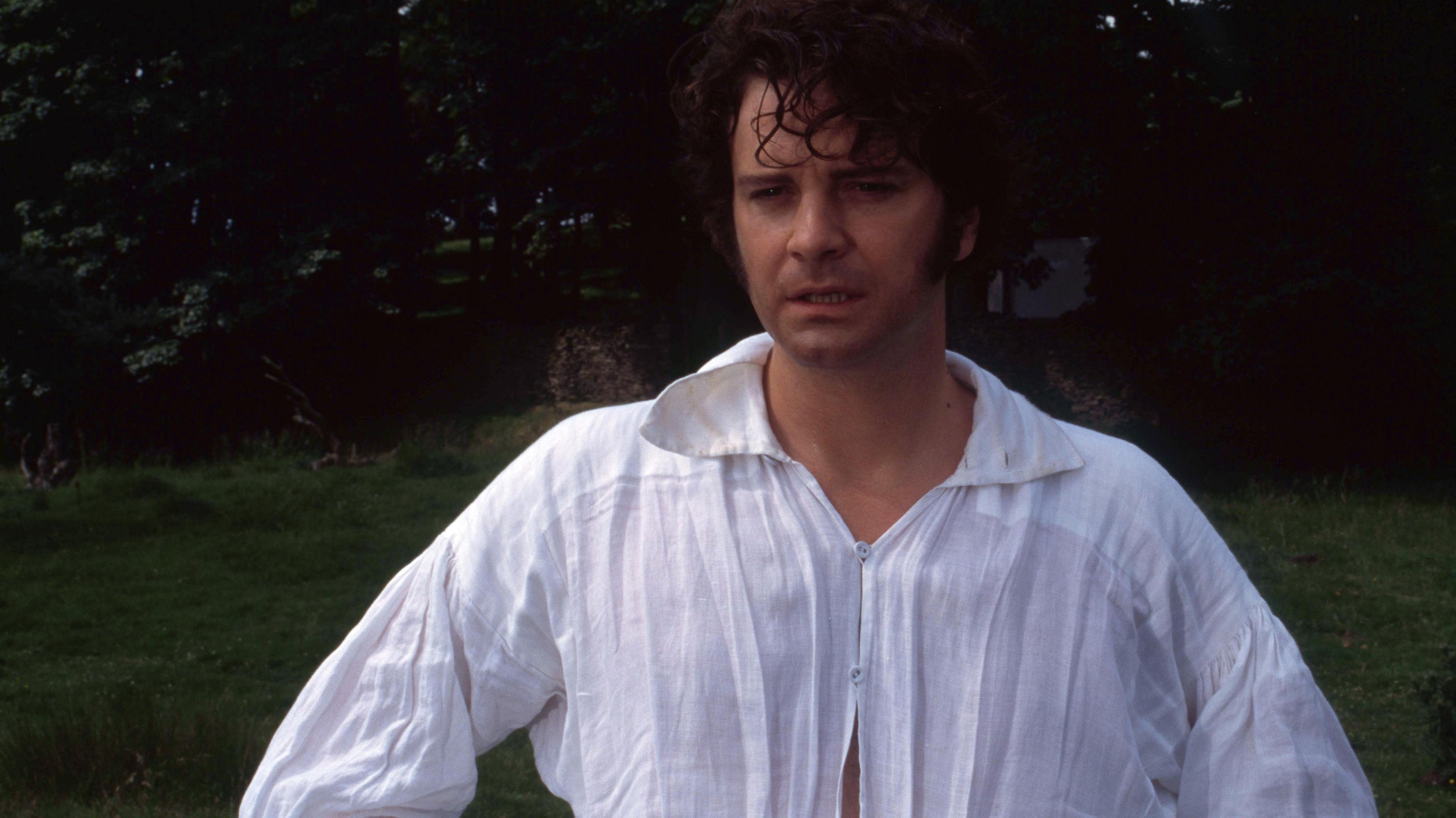 A still from Pride and Prejudice 1995. The picture shows Colin Firth as Mr Darcy appearing wet after emerging from a lake.