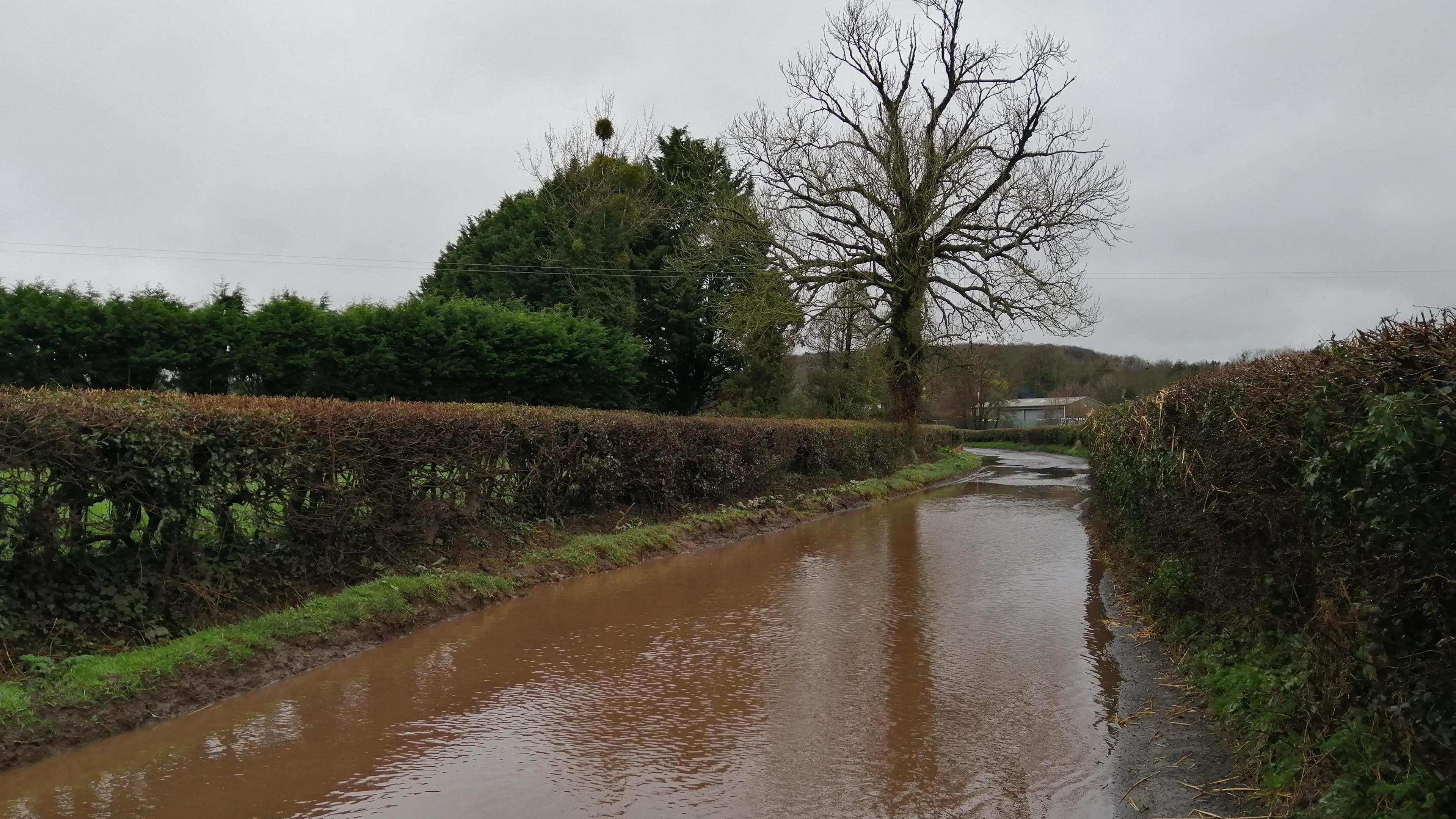 Flood waters submerge a road in Hereford