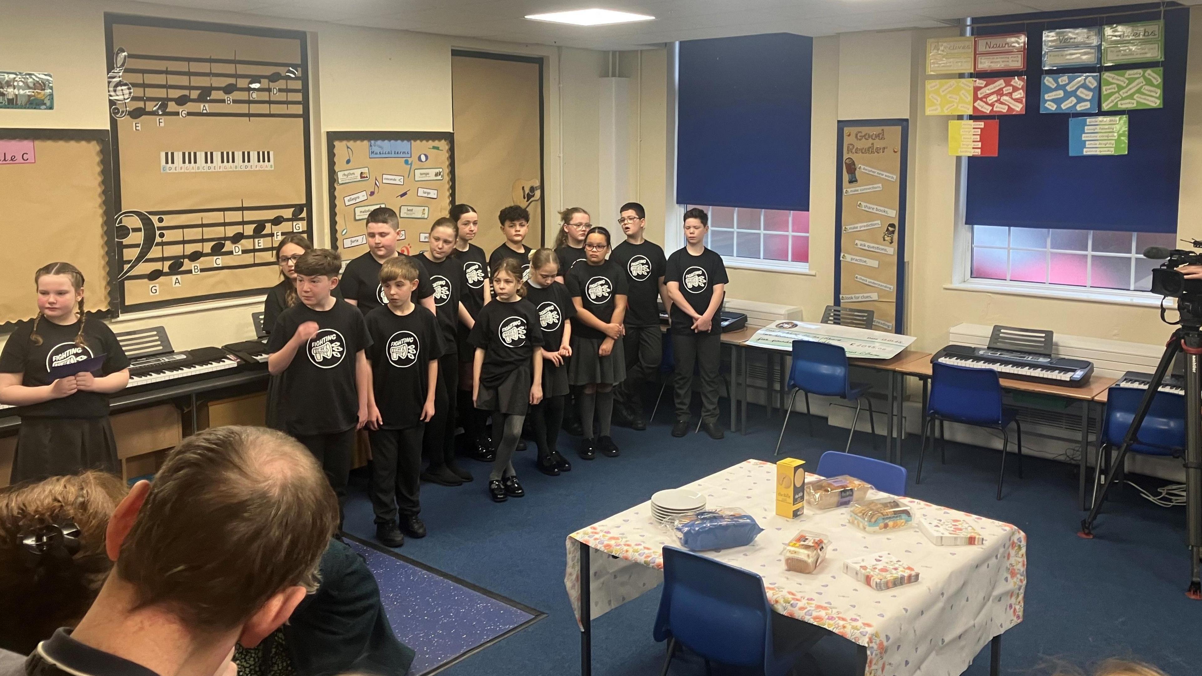 Photograph of children singing in the music room at St Jospeh's Catholic Primary in Reddish