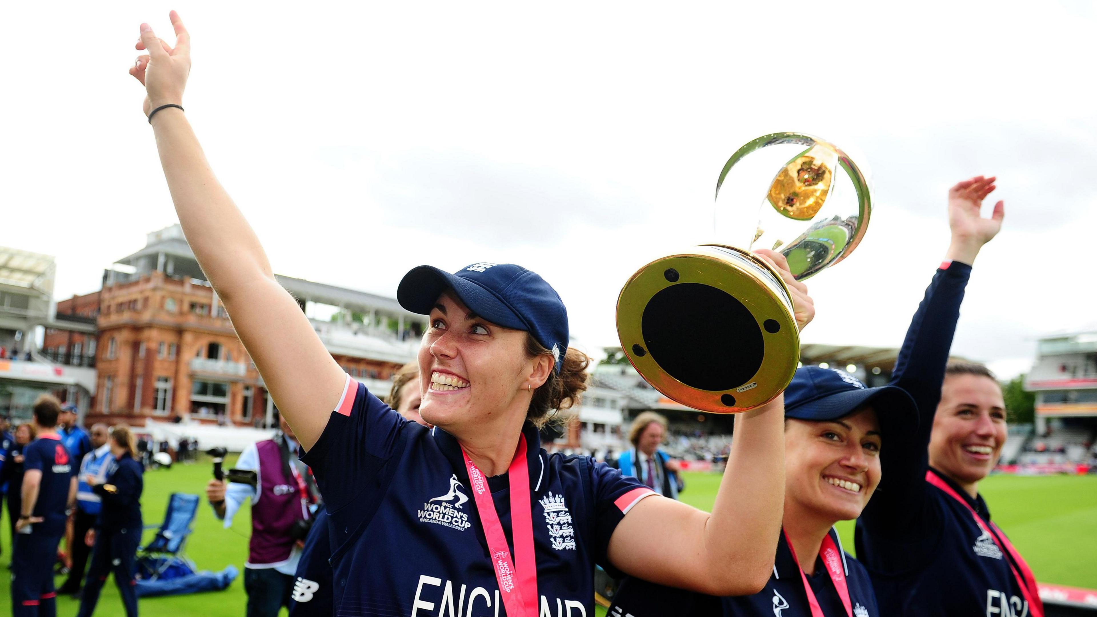 Natalie Sciver-Brunt celebrates with the Women's World Cup trophy after victory over India at Lord's in 2017