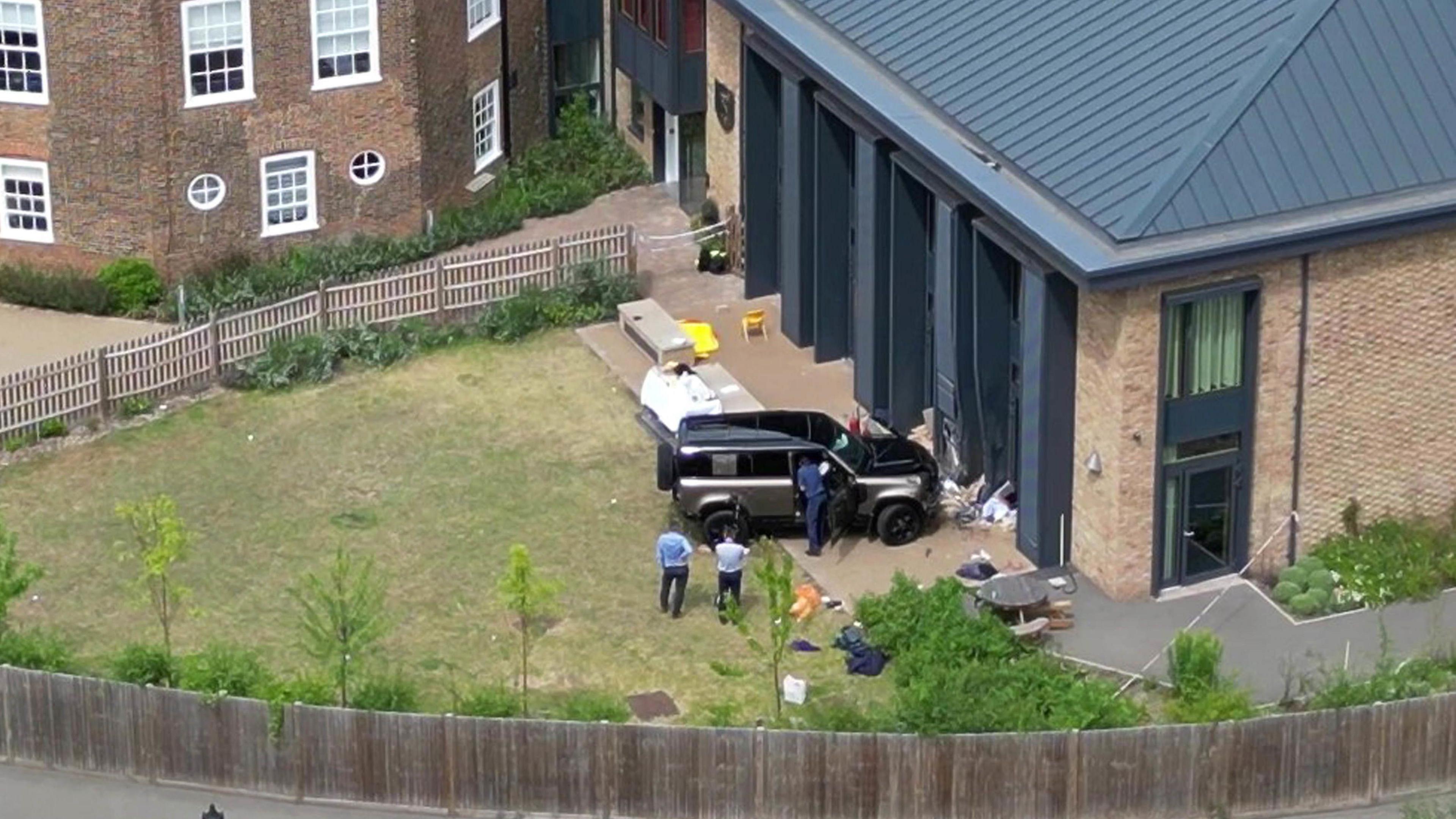 An overhead view of the scene of the Land Rover crashed into the schoolol playground