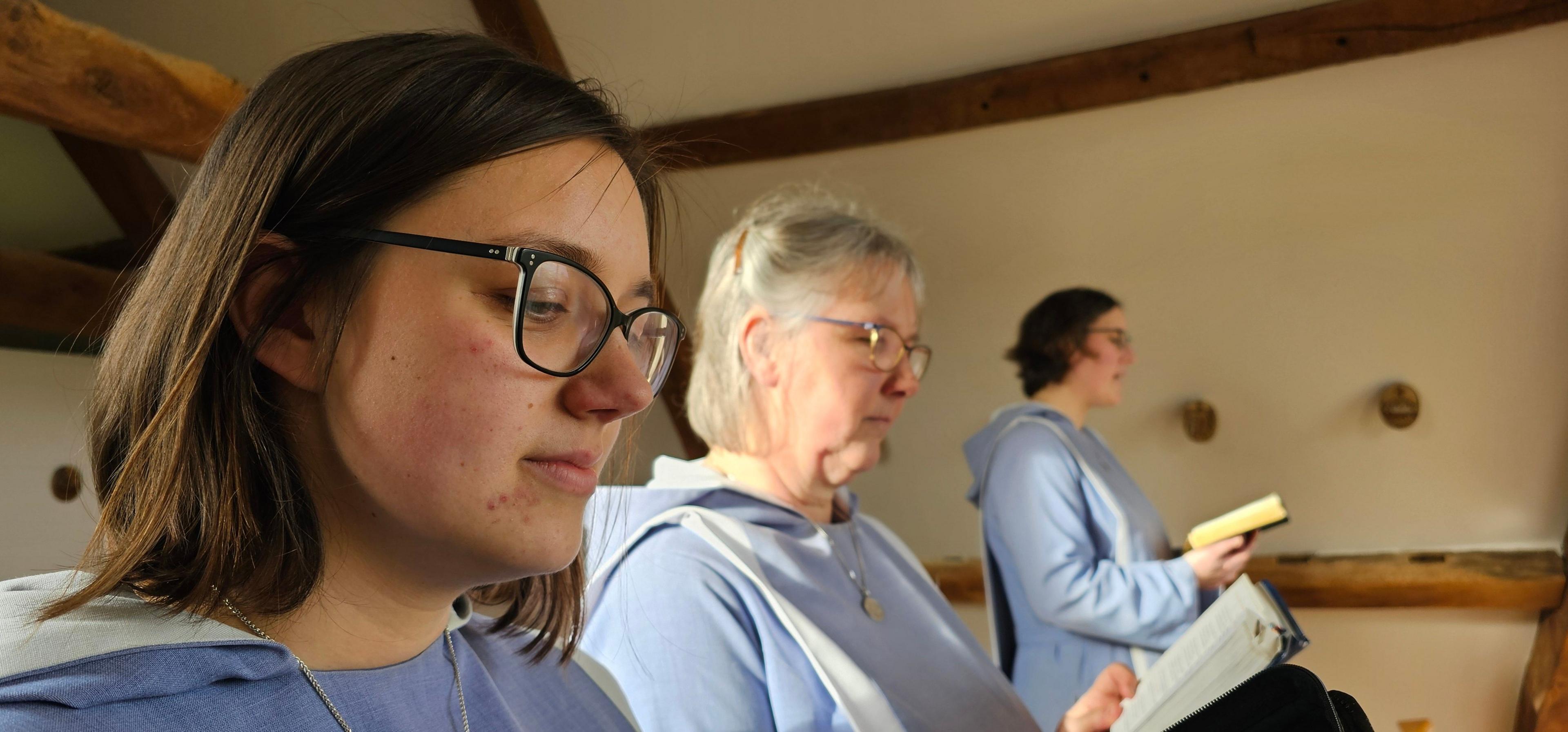 Three sisters praying