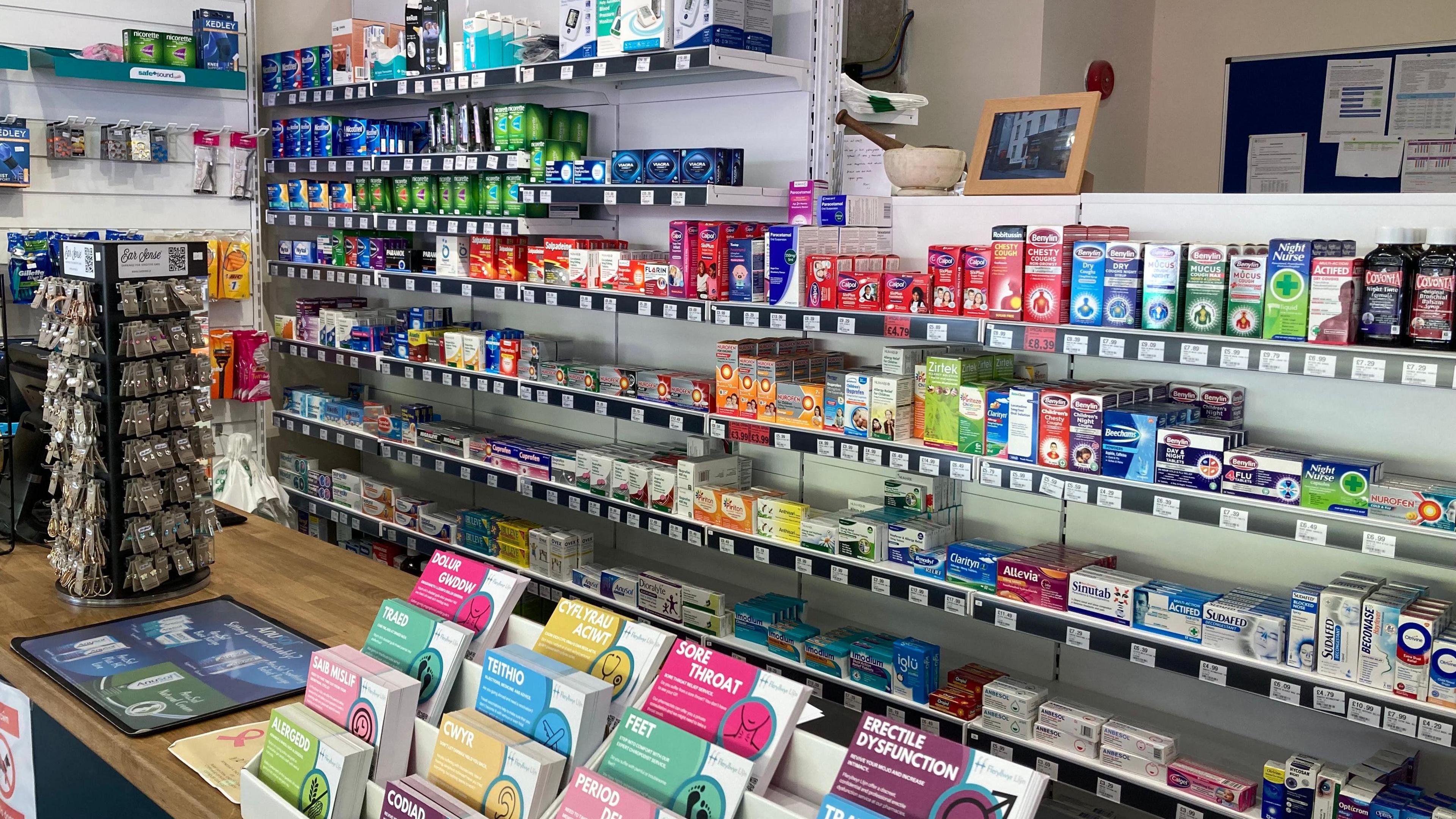 Drugs and other products on display in a pharmacy