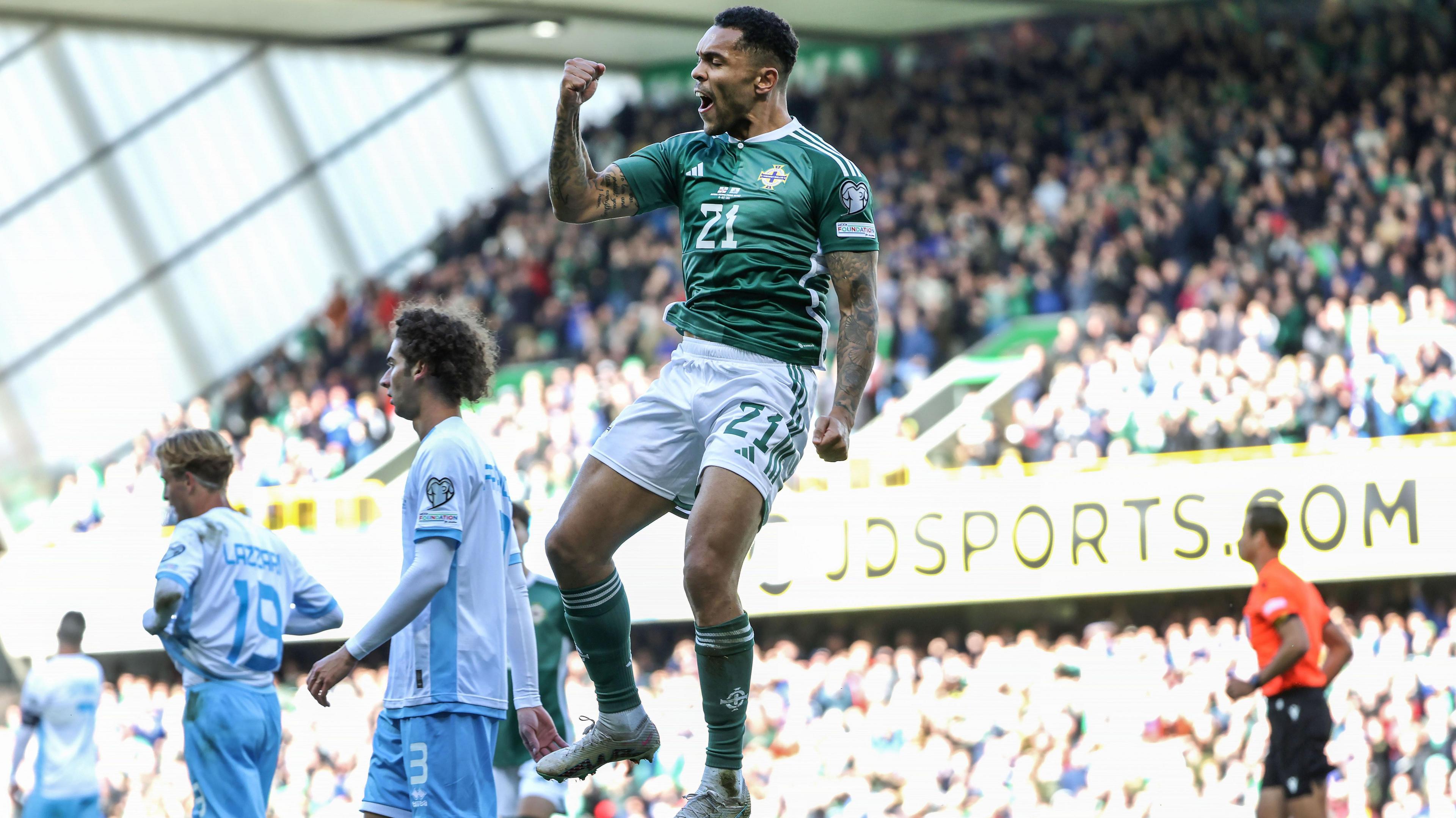 Josh Magennis celebrates