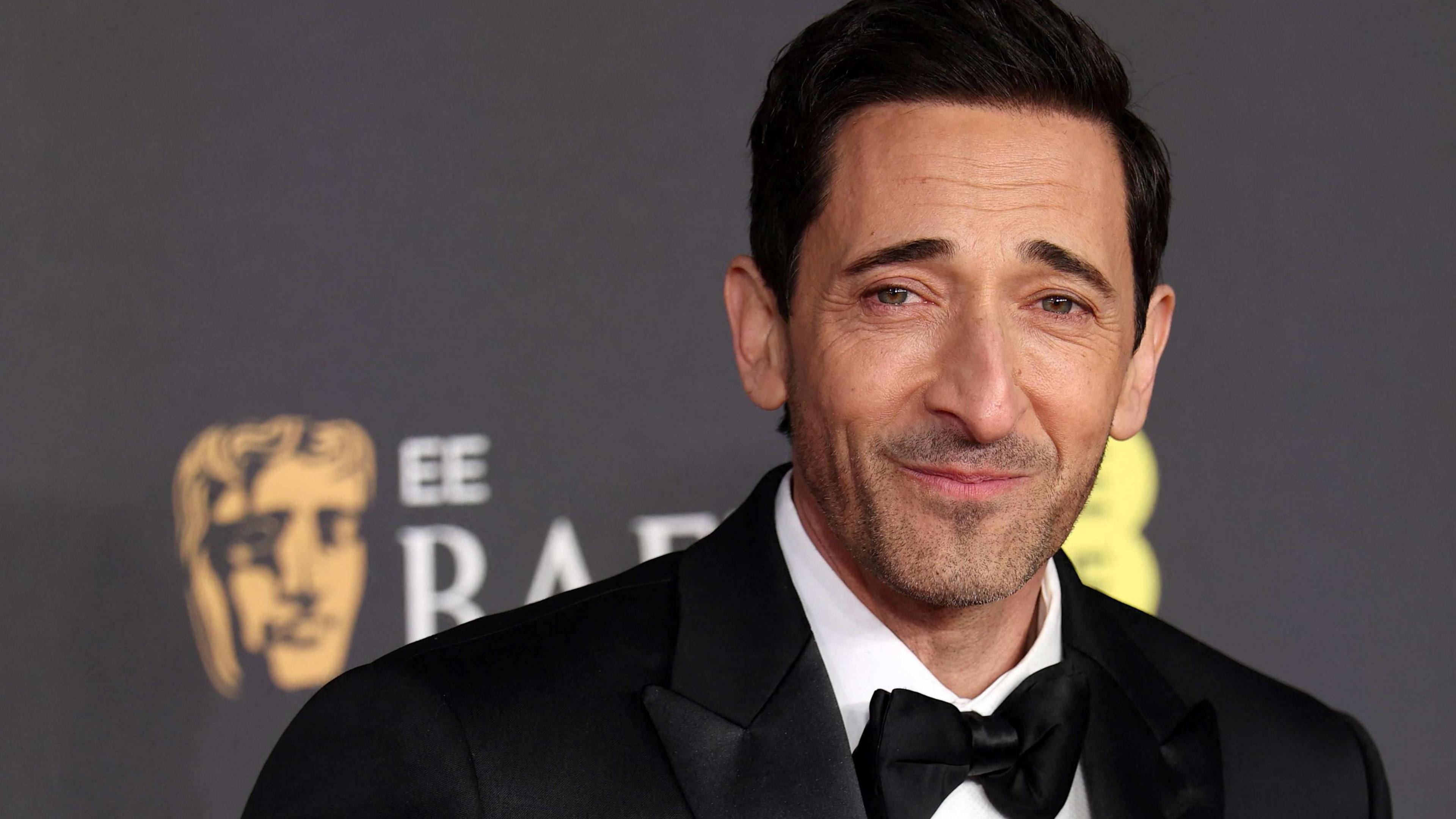 Adrien Brody on the Bafta red carpet in a black tux