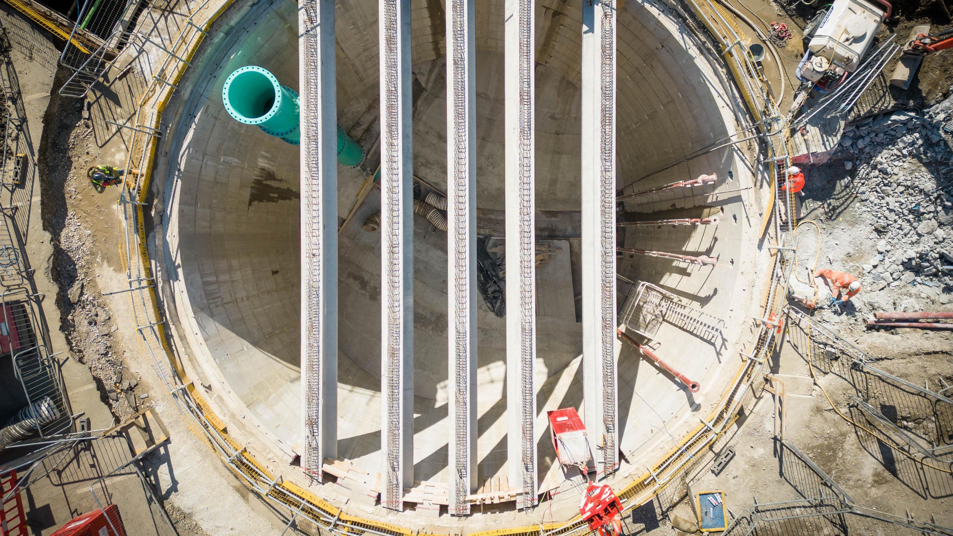 Aerial view of a huge underground storage tank under construction.