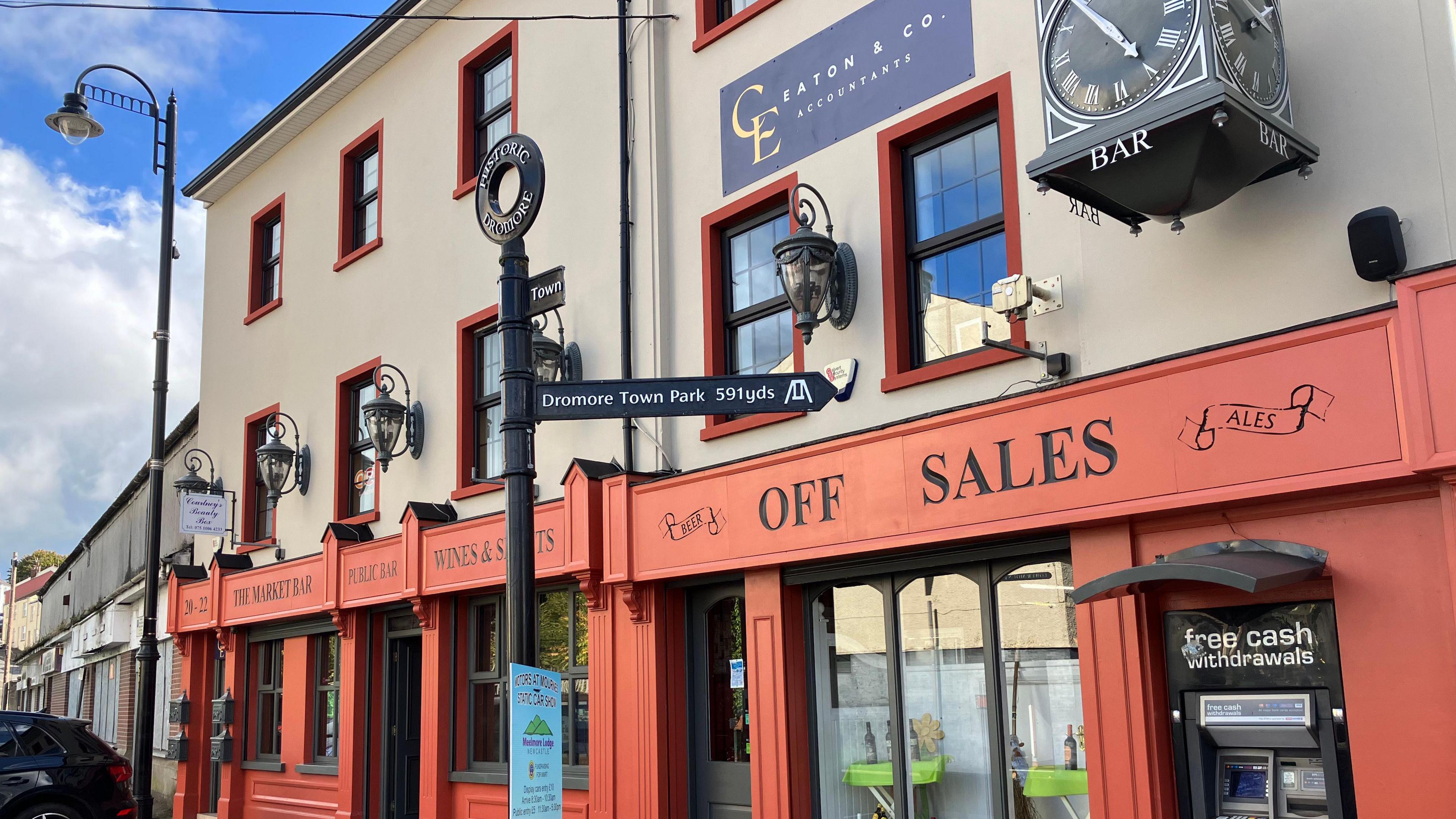 A bar and off-sales in Dromore which has been painted a nice russet colour as part of the town's revitalisation project