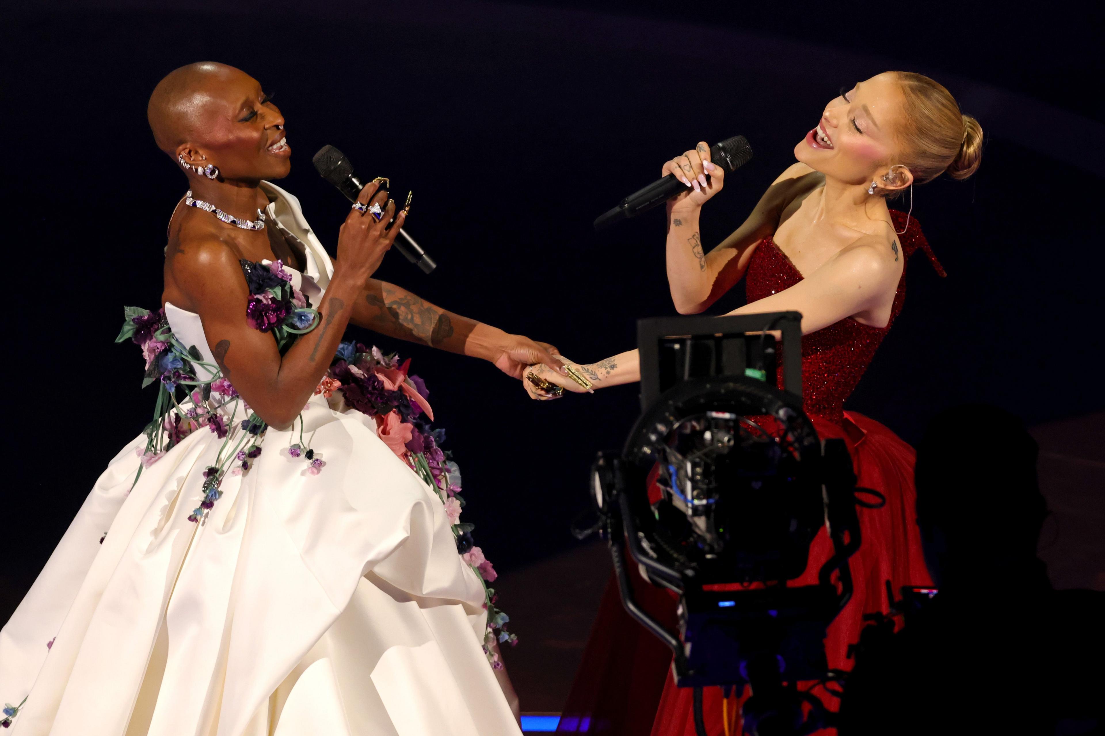 Ariana Grande and Cynthia Erivo perform on stage at the Oscars ceremony 