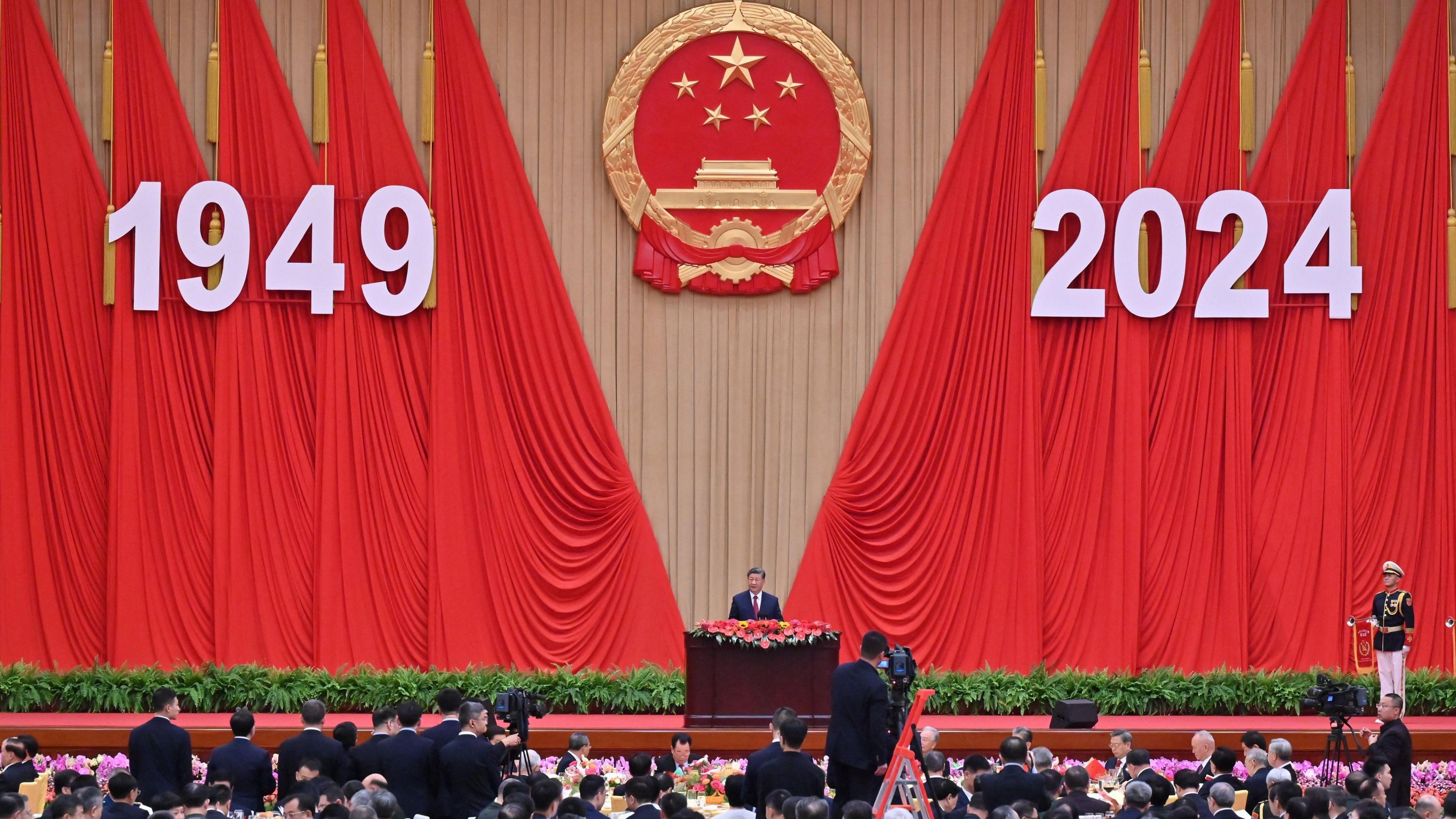 China's President Xi Jinping speaks during a National Day reception on the eve of the 75th anniversary of the People's Republic of China.