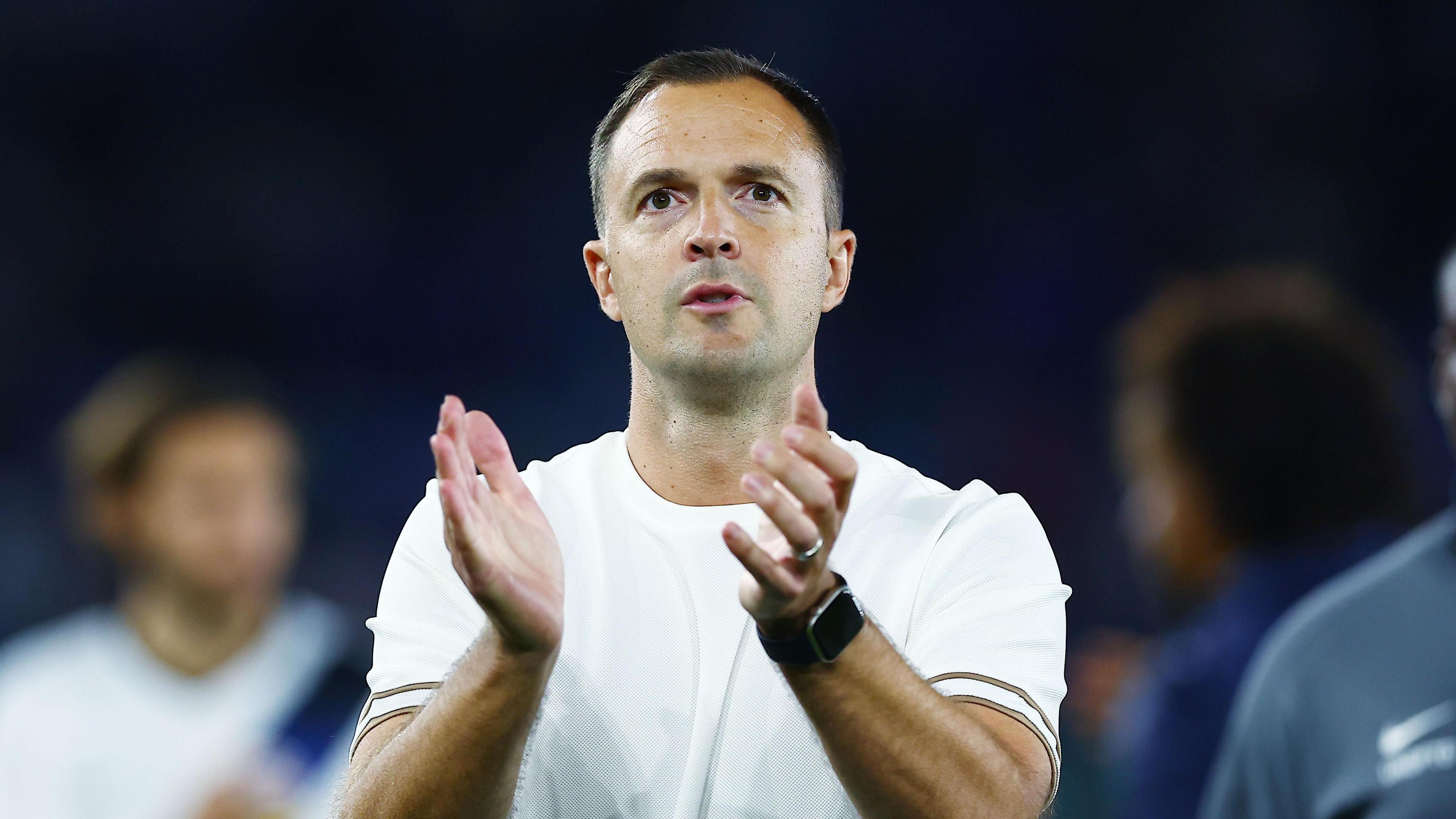 Birmingham boss Chris Davies applauds the fans at Leicester