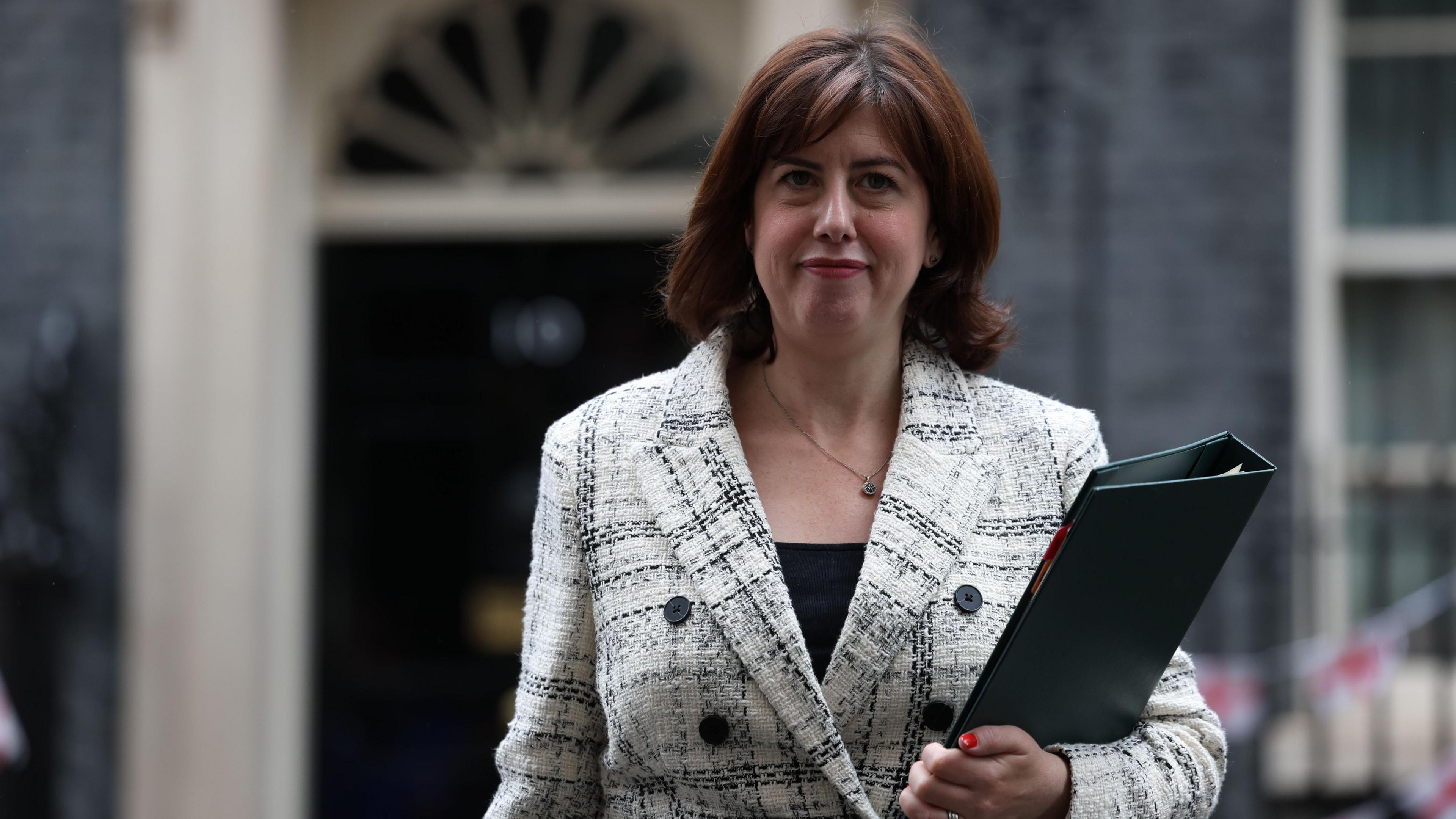 Lucy Powell clutching a file outside 10 Downing Street