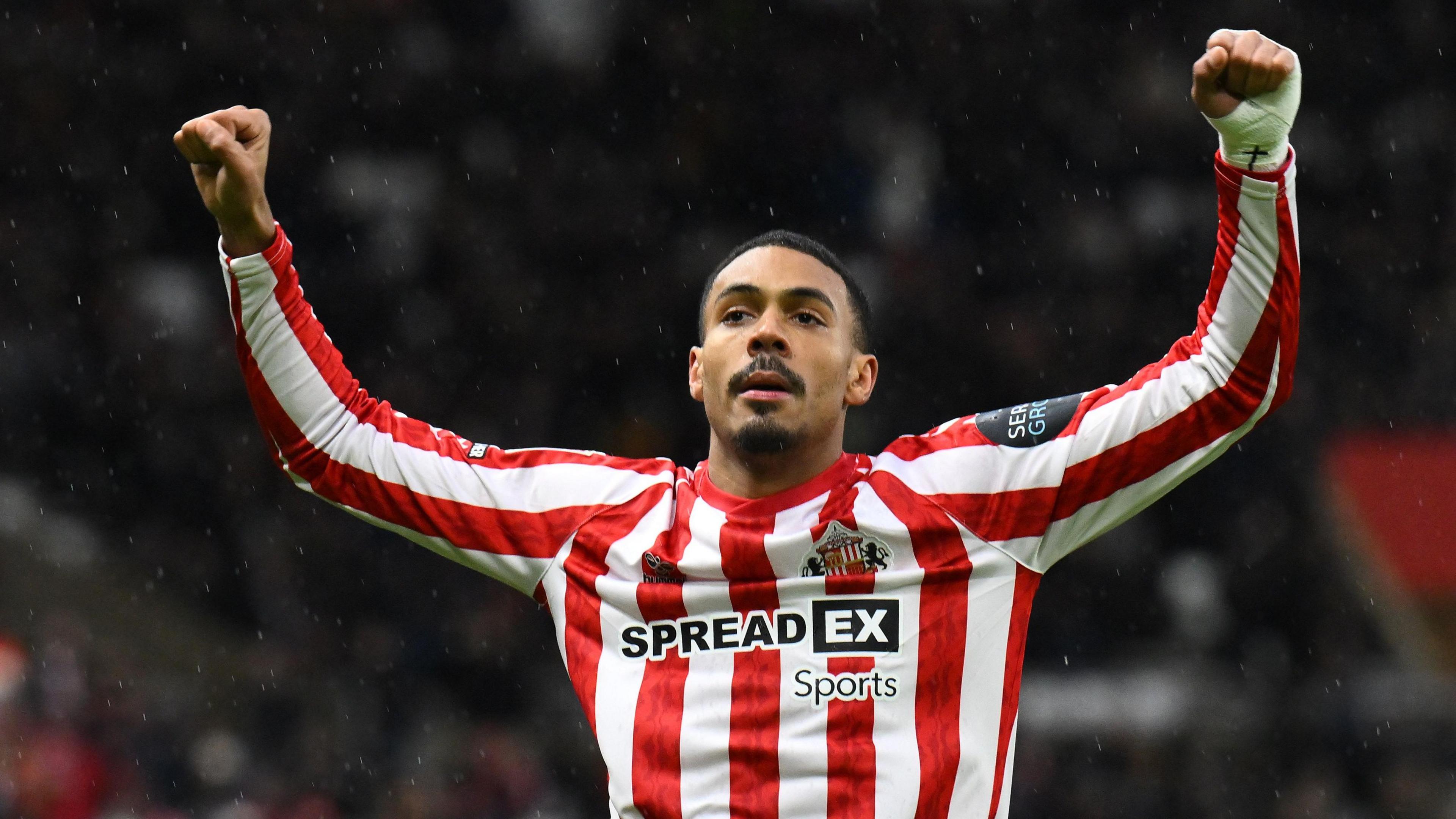 Wilson Isidor celebrating scoring a goal for Sunderland.