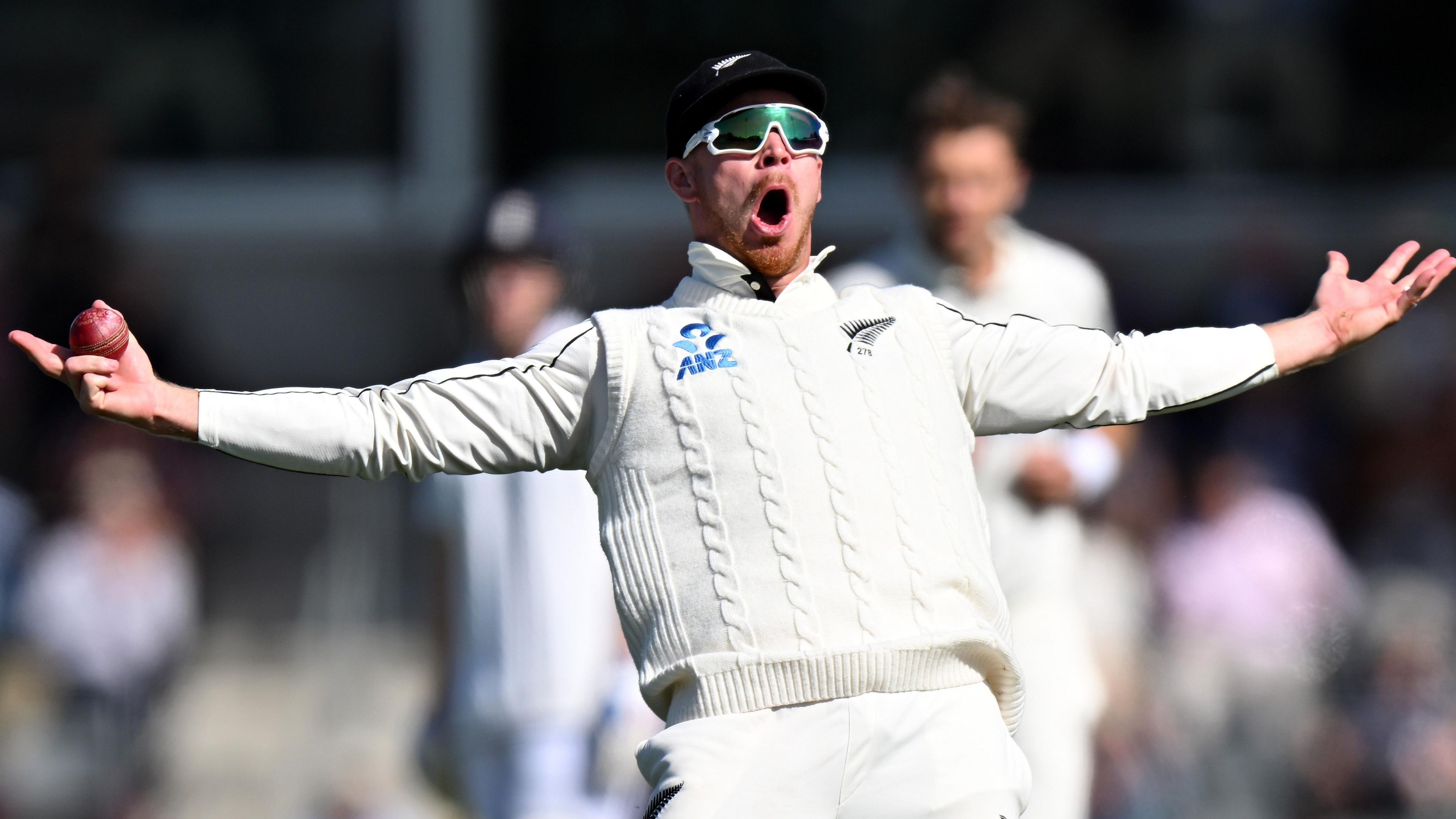 Glenn Phillips celebrates a catch