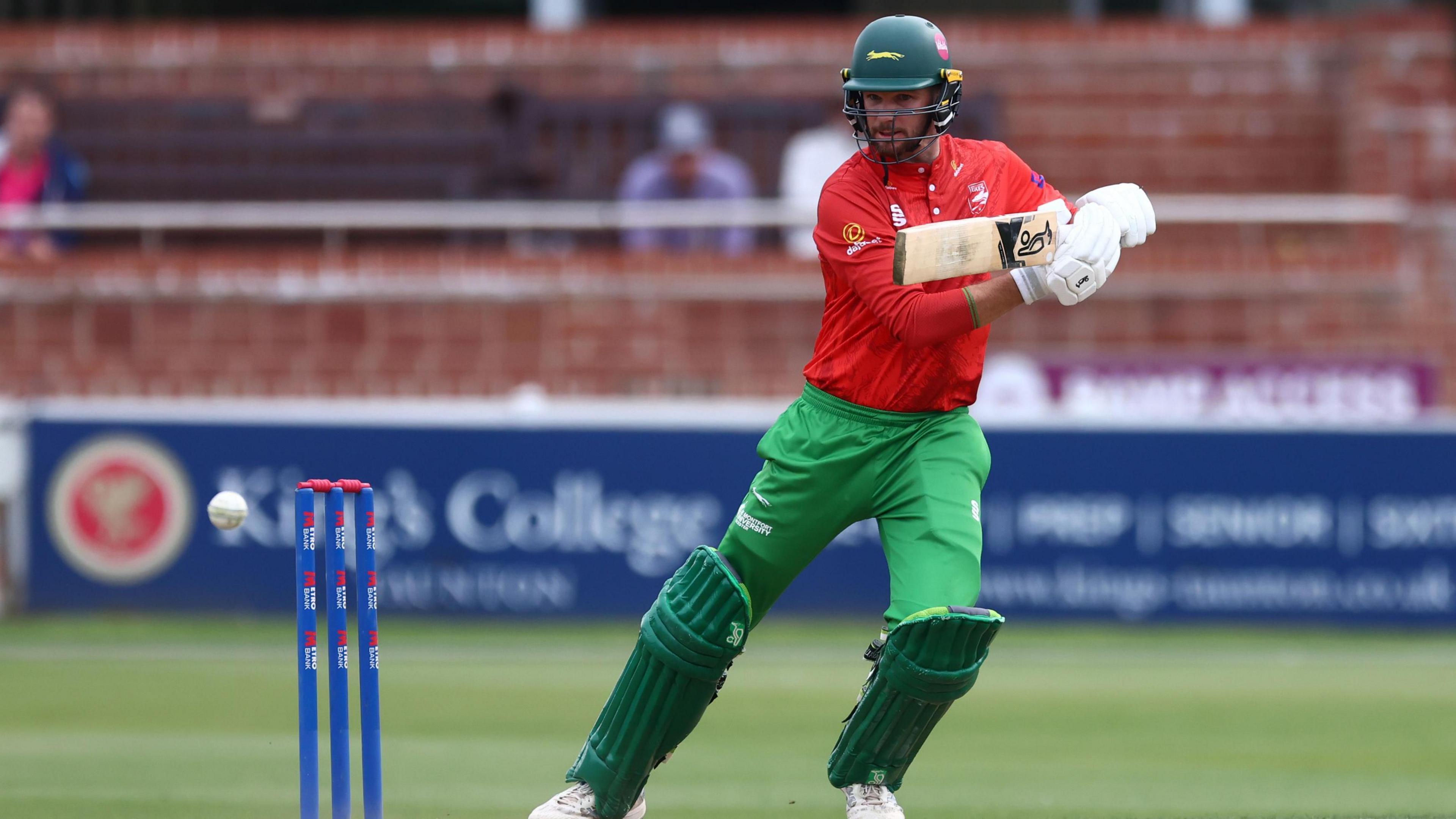 Peter Handscomb hits a Leicestershire boundary through the off side