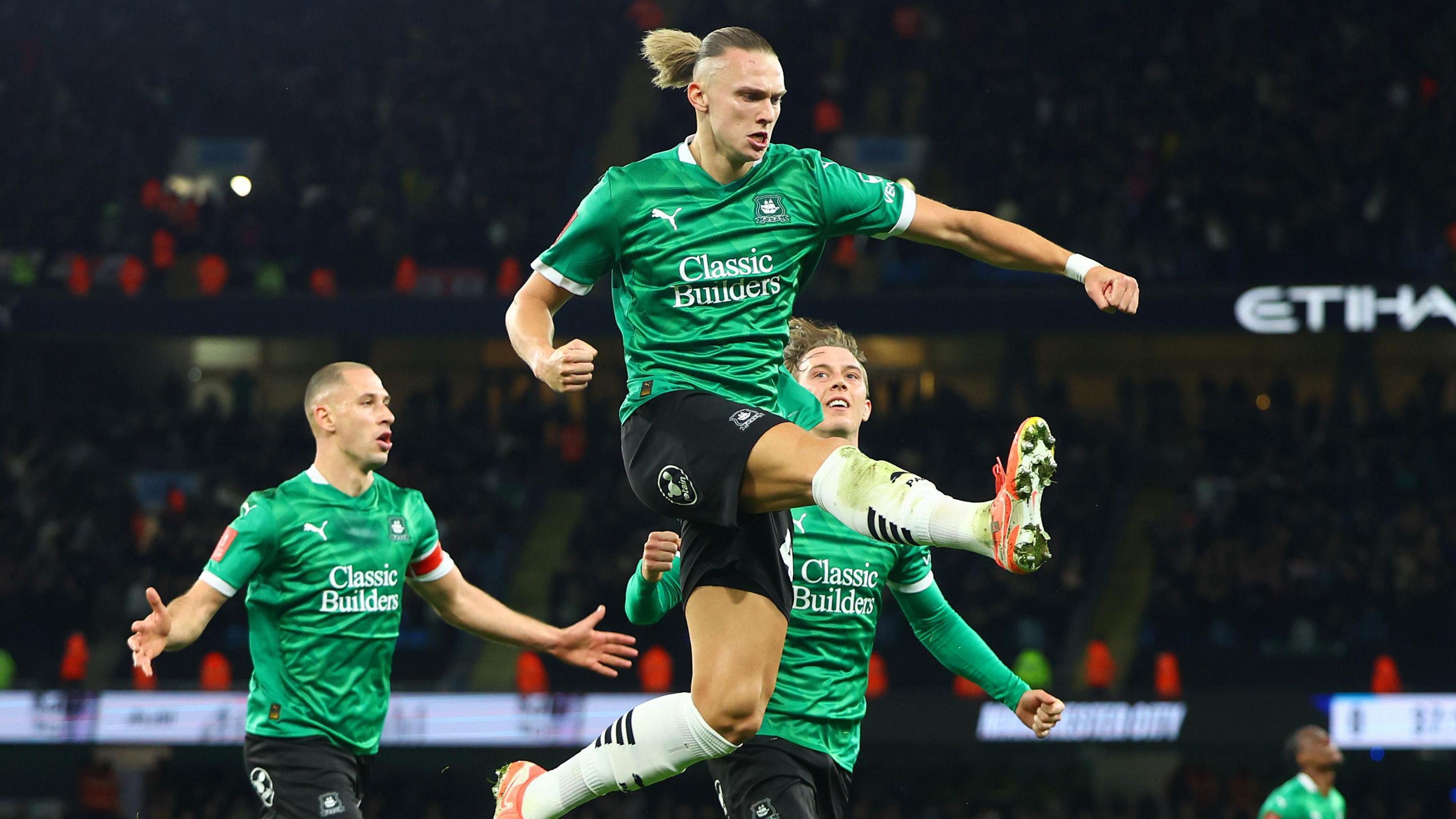 Maksym Talovierov celebrates scoring for Argyle