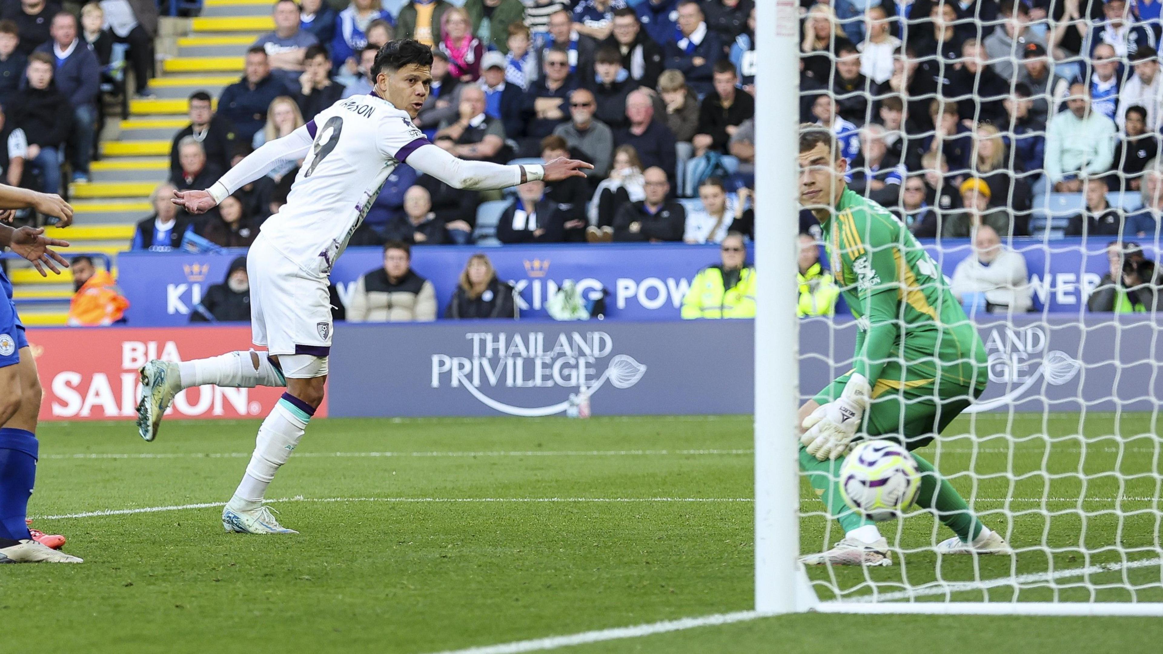 Evanilson watches the ball drop into the net only for Bournemouth's goal to be ruled offside. 