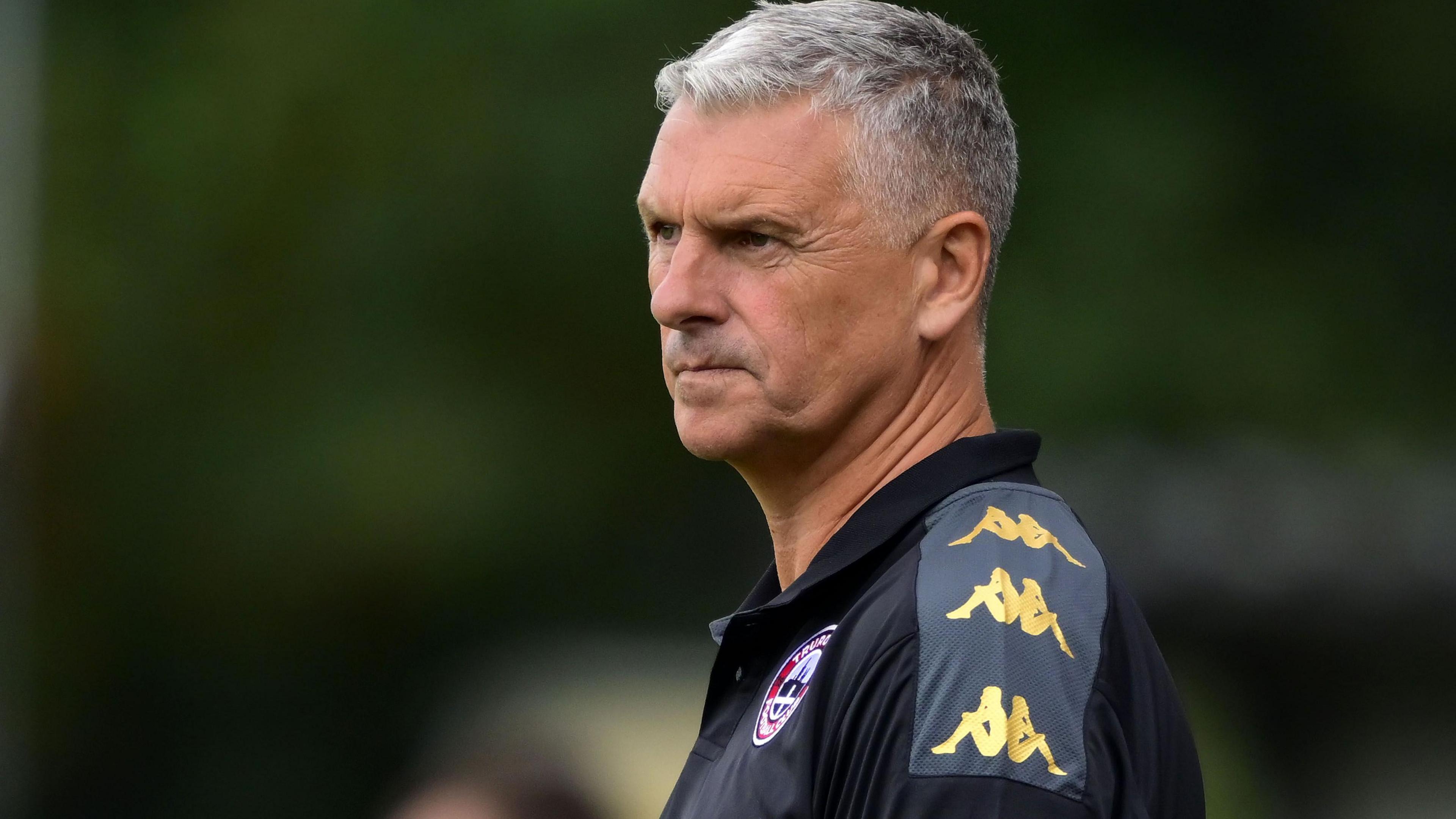 Truro City boss John Askey watches on from the sidelines