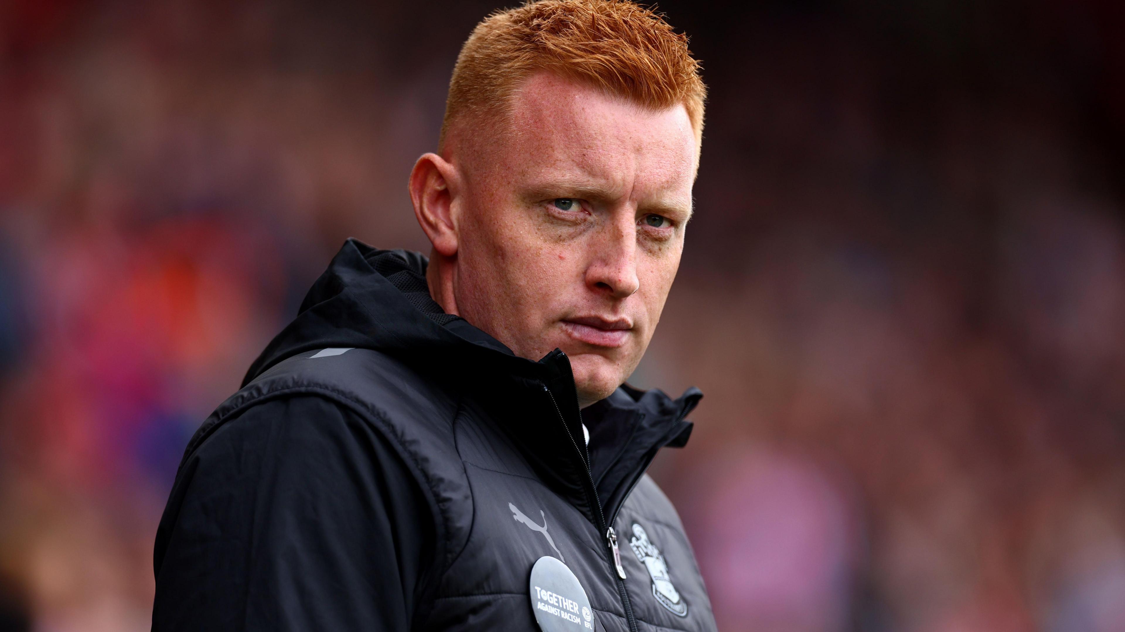 Southampton manager Will Still stands on the touchline