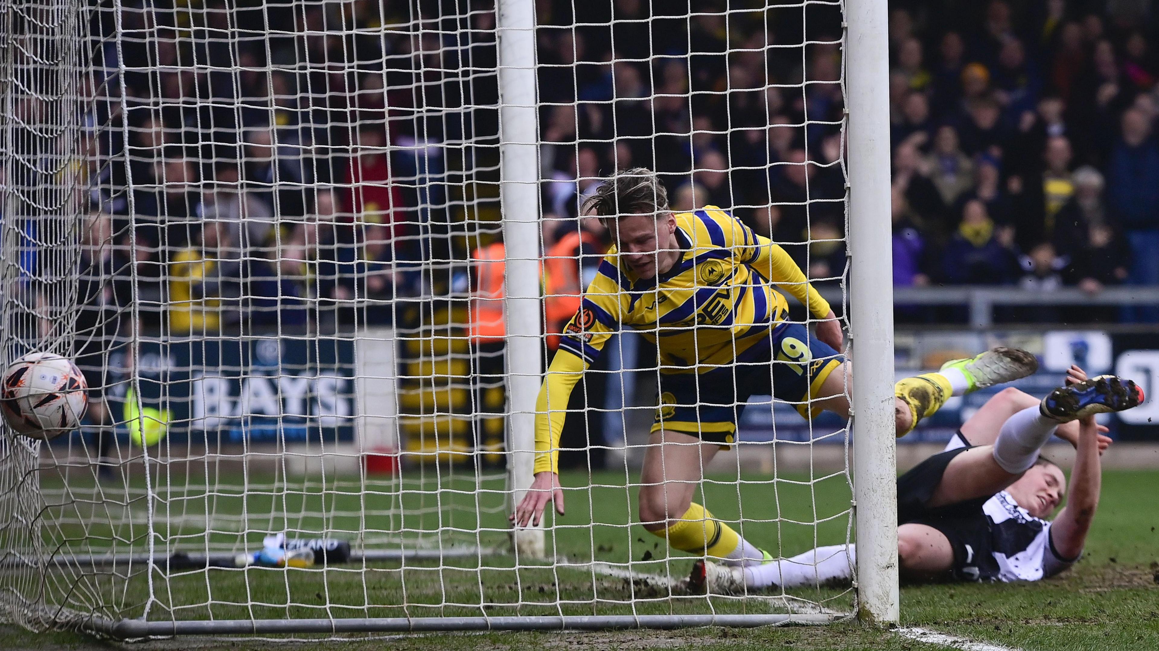 Cody Cooke scores from close range for Torquay United