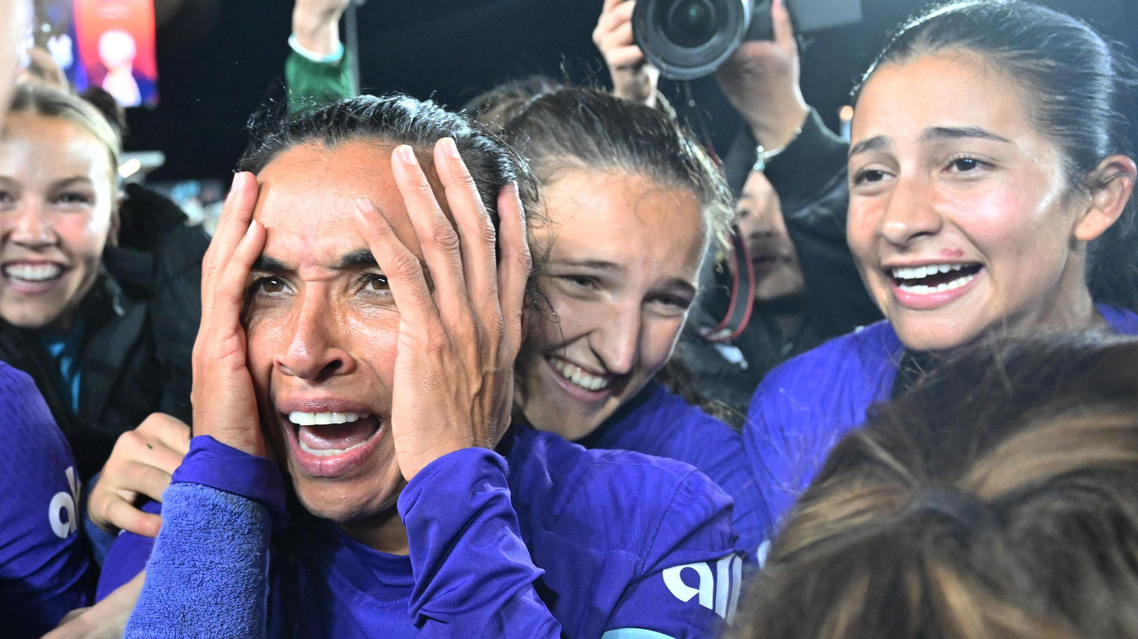 Marta and her Orlando Pride team-mates celebrate winning the NWSL championship game 