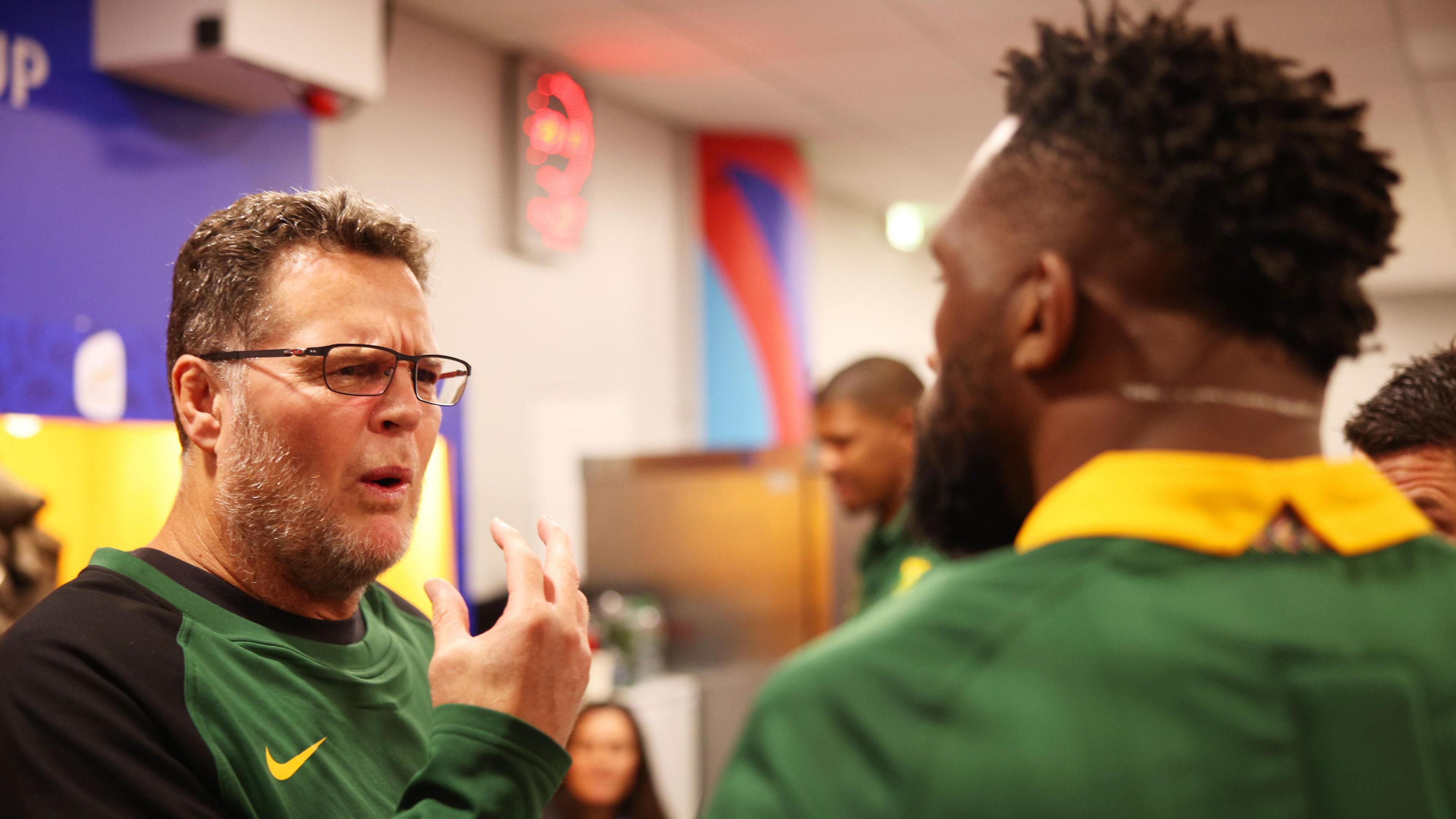 Rassie Erasmus talks to South Africa's double World Cup winning captain Siya Kolisi