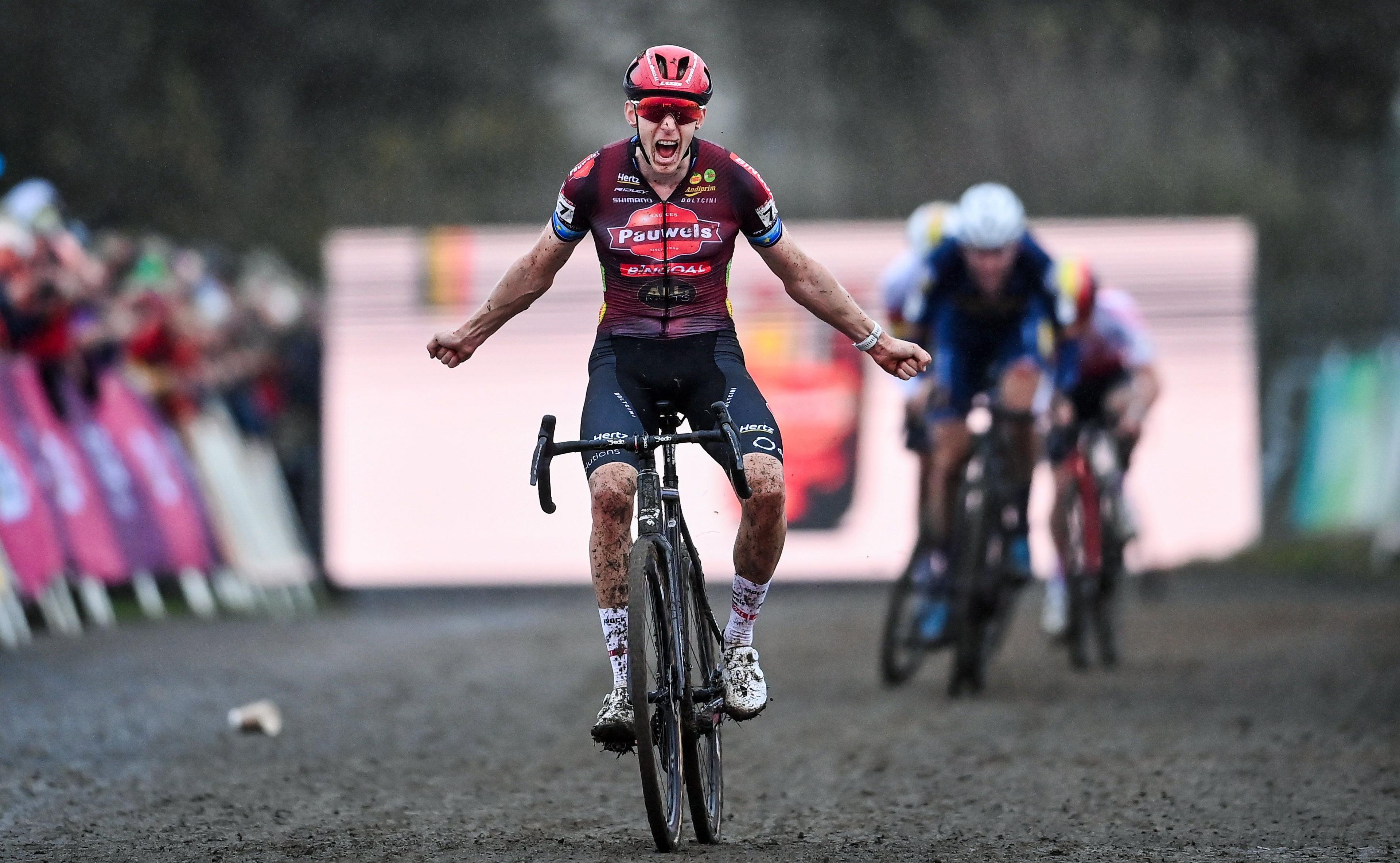 Michael Vanthourenhout of Belgium celebrates winning the Men's Elite race at the UCI Cyclo-cross World Cup on the Sport Ireland Campus in Dublin.