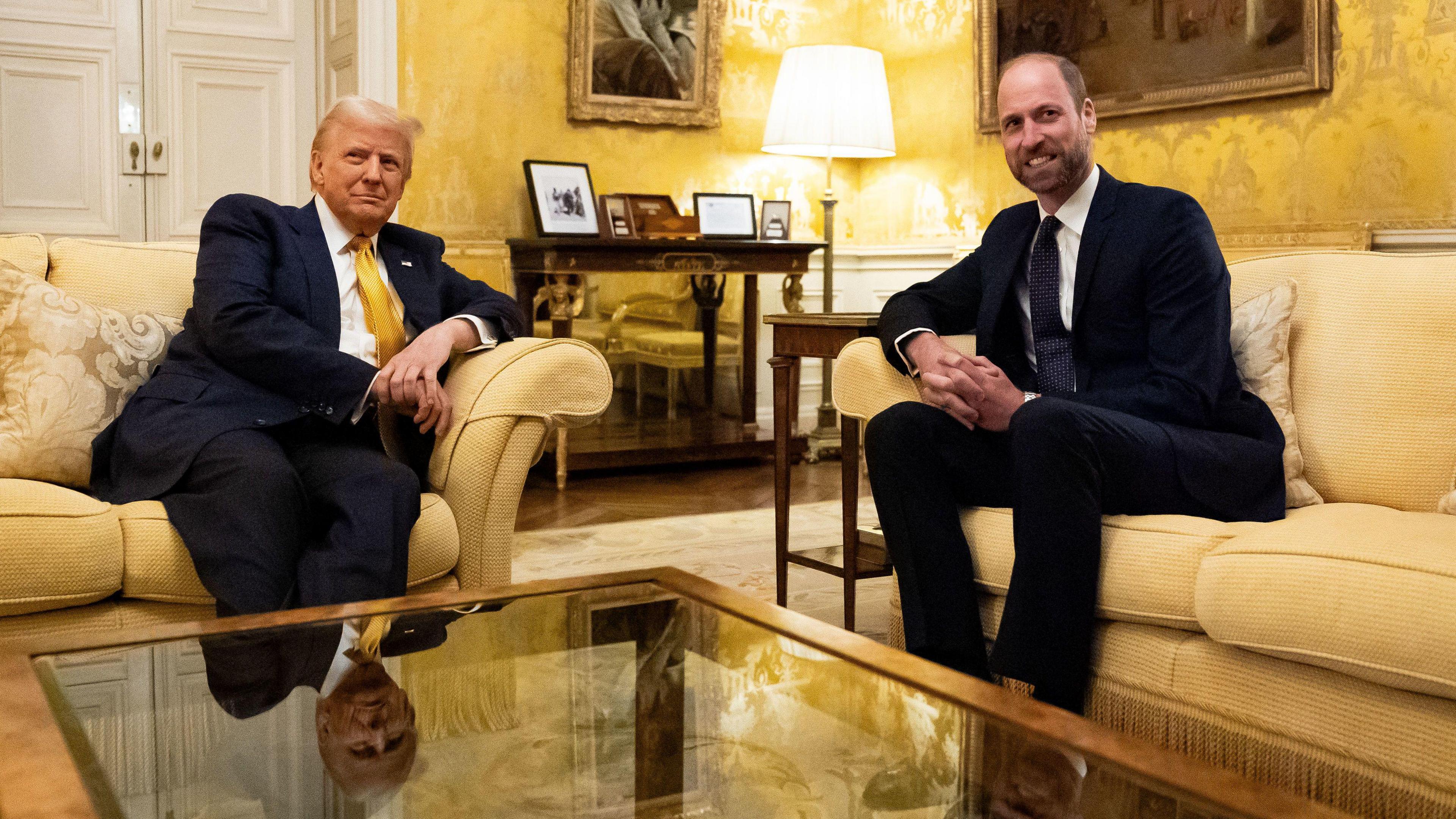 The Prince of Wales (right) meeting US President Elect, Donald Trump in the Salon Jaune room at the UK Ambassadors residence in Paris. They are both sitting.