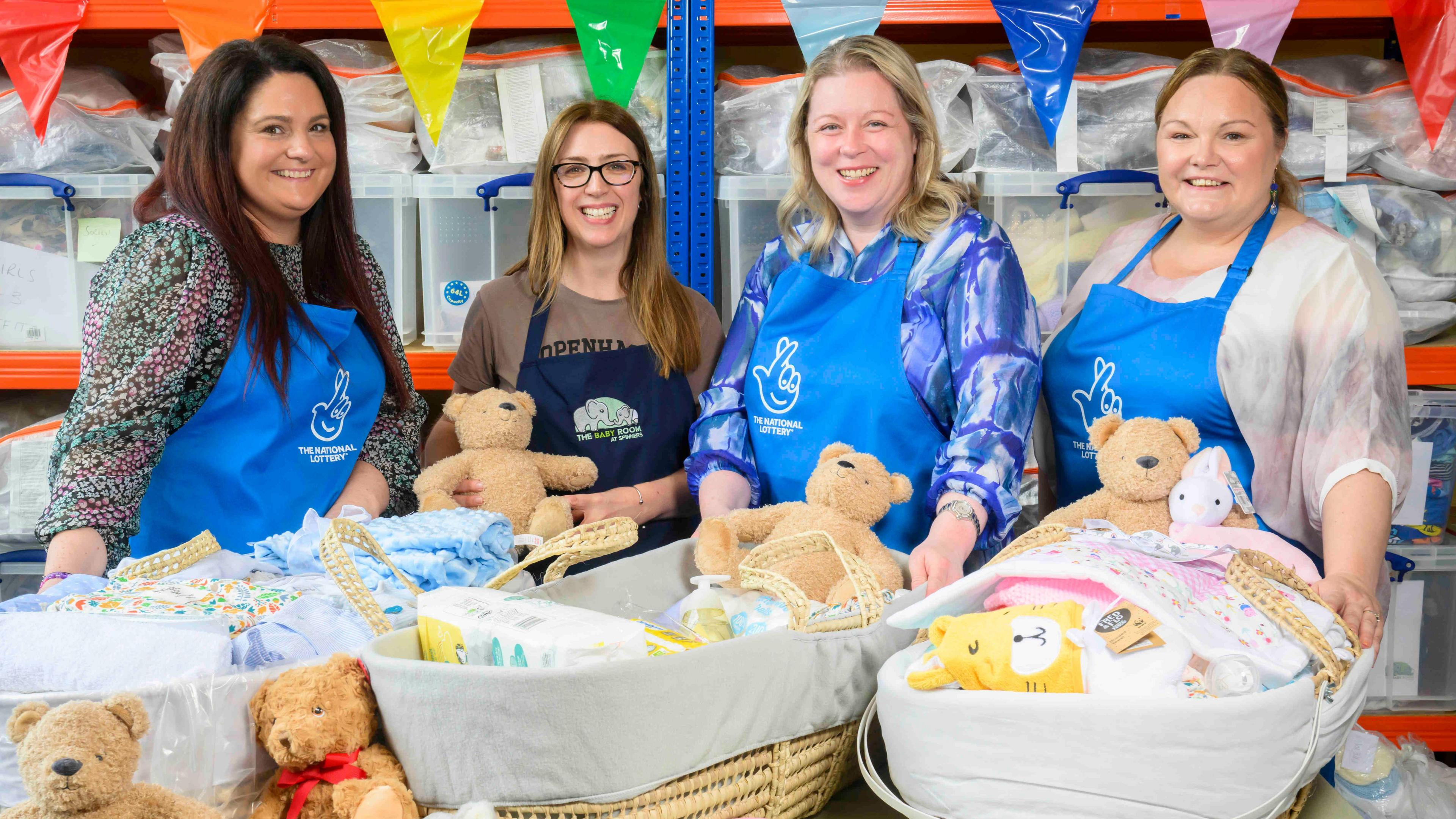 Ms Breen with other Baby Room supporters and some baby items