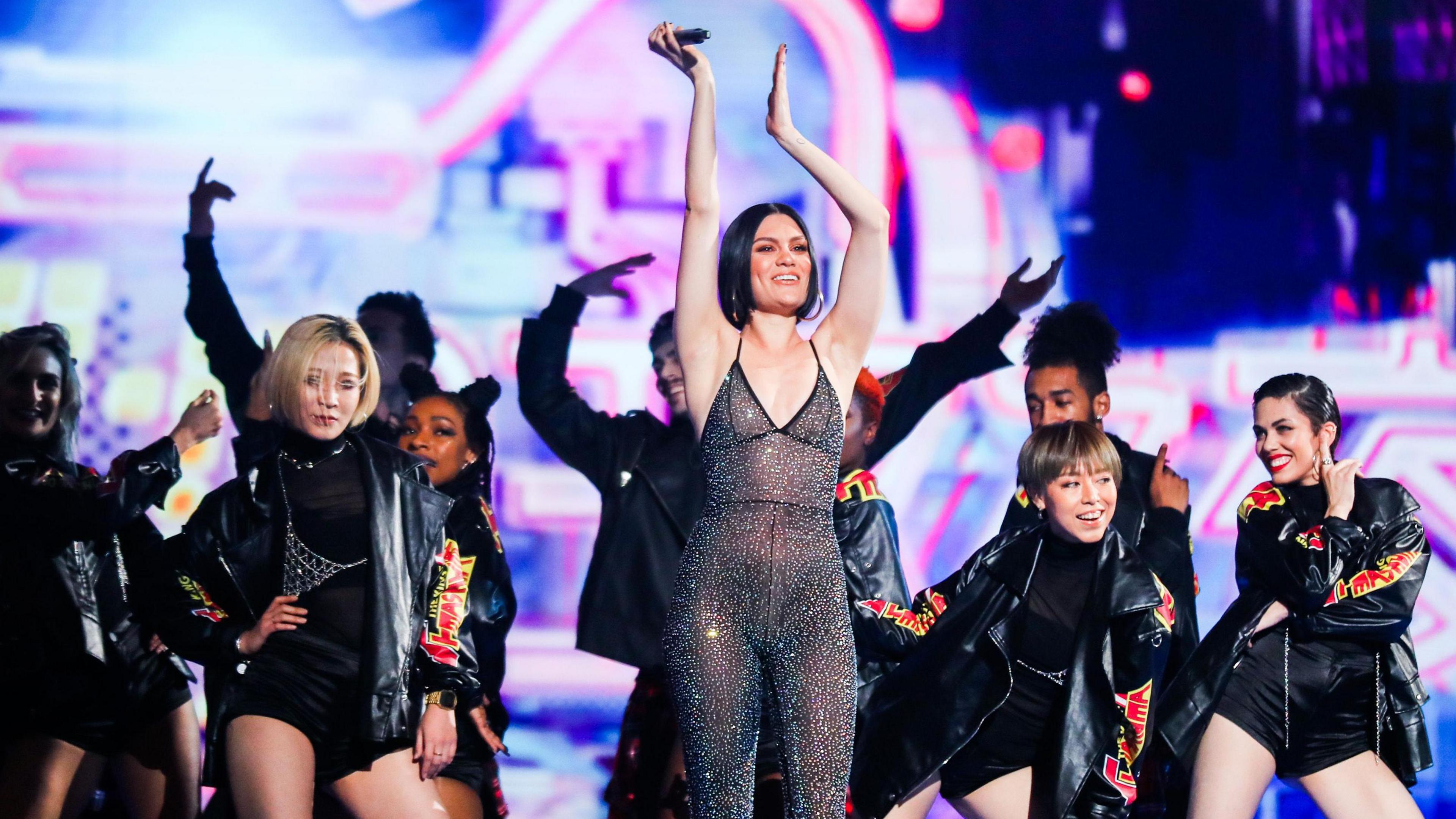 Singer Jessie J performs on the stage alongside dancers during the 2017 Alibaba Singles' Day Global Shopping Festival gala in Shanghai