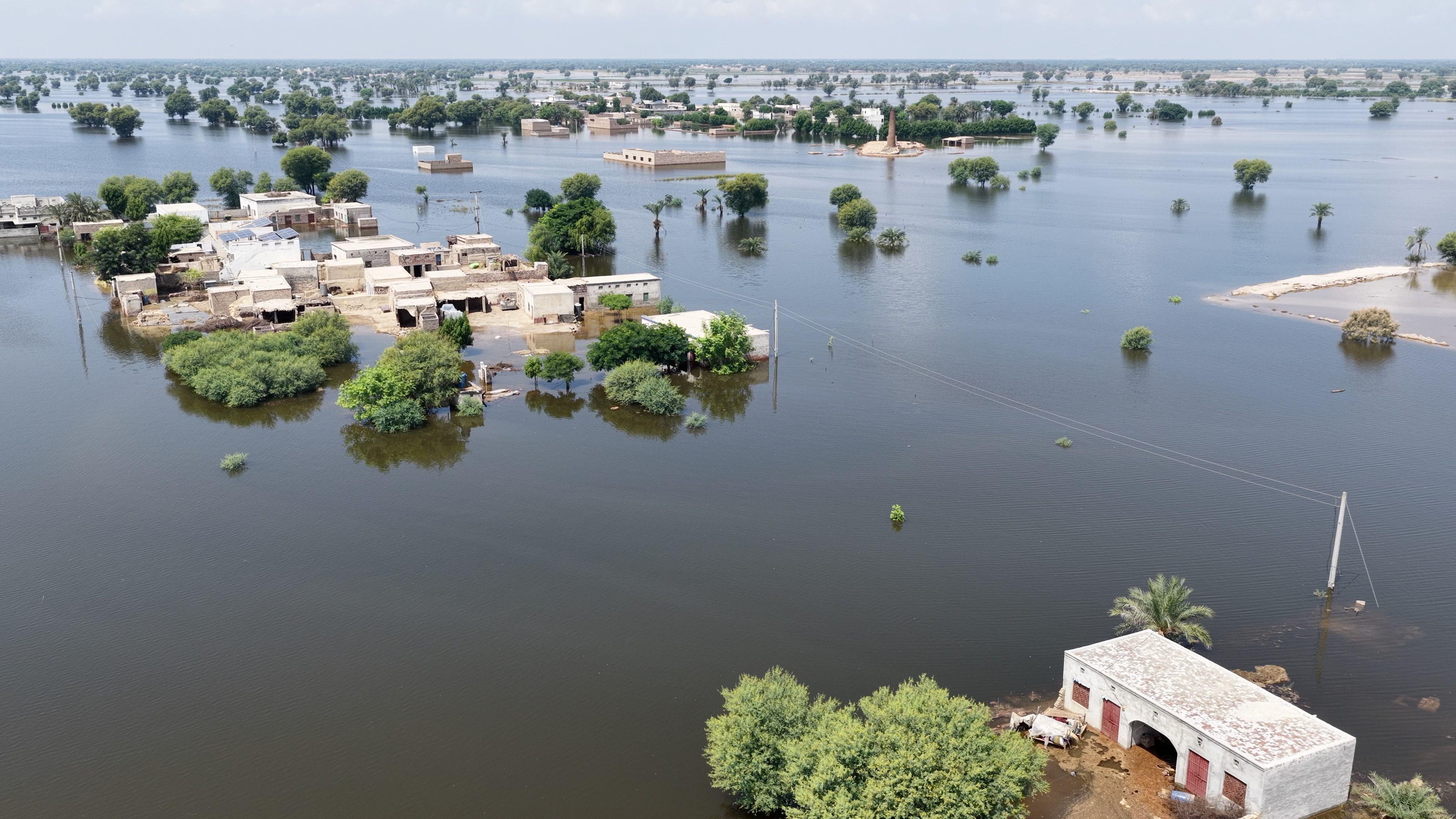 A long shot of buildings partially submerged in water