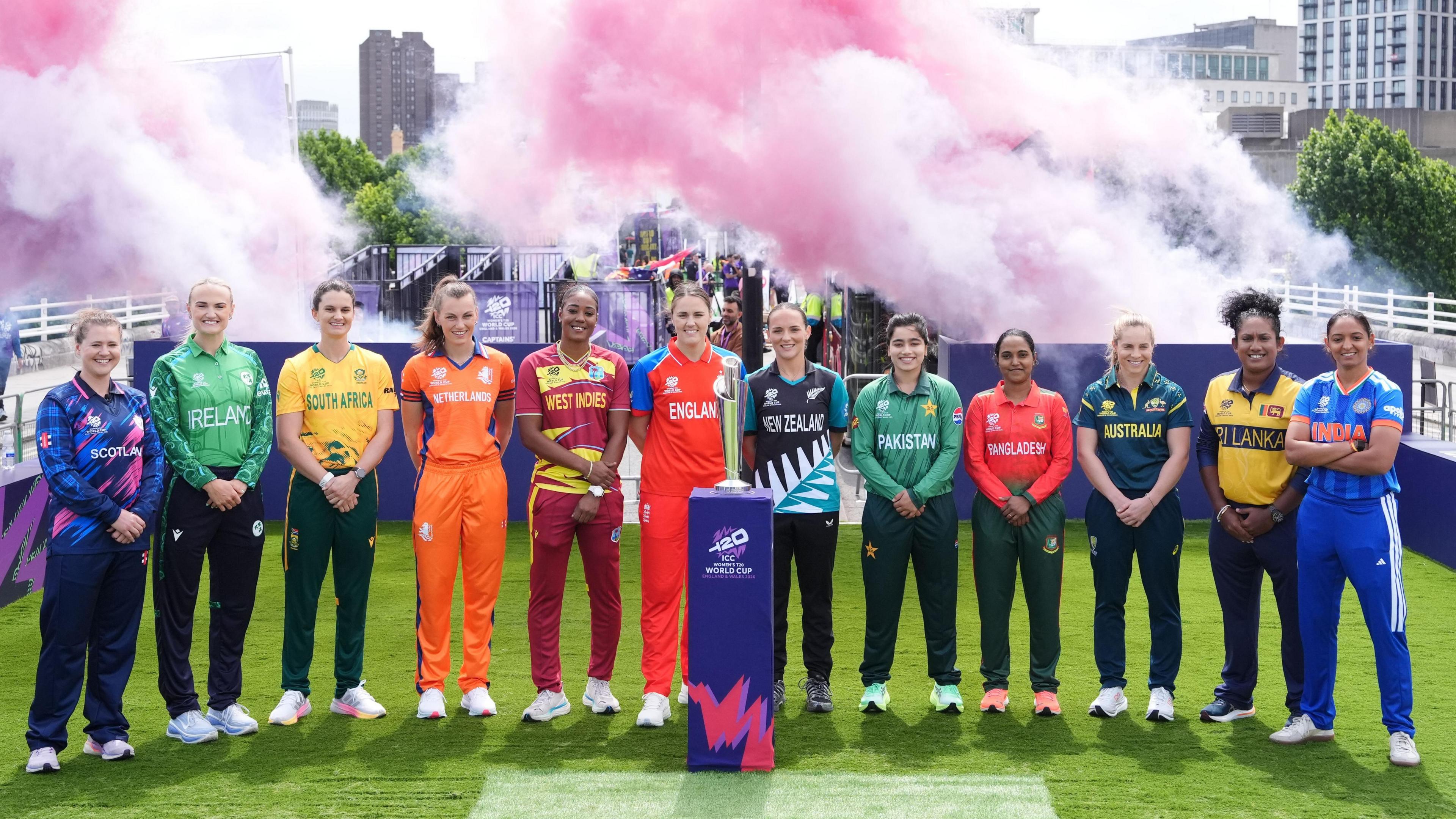 Team captains at the Women's T20 World Cup with the trophy 