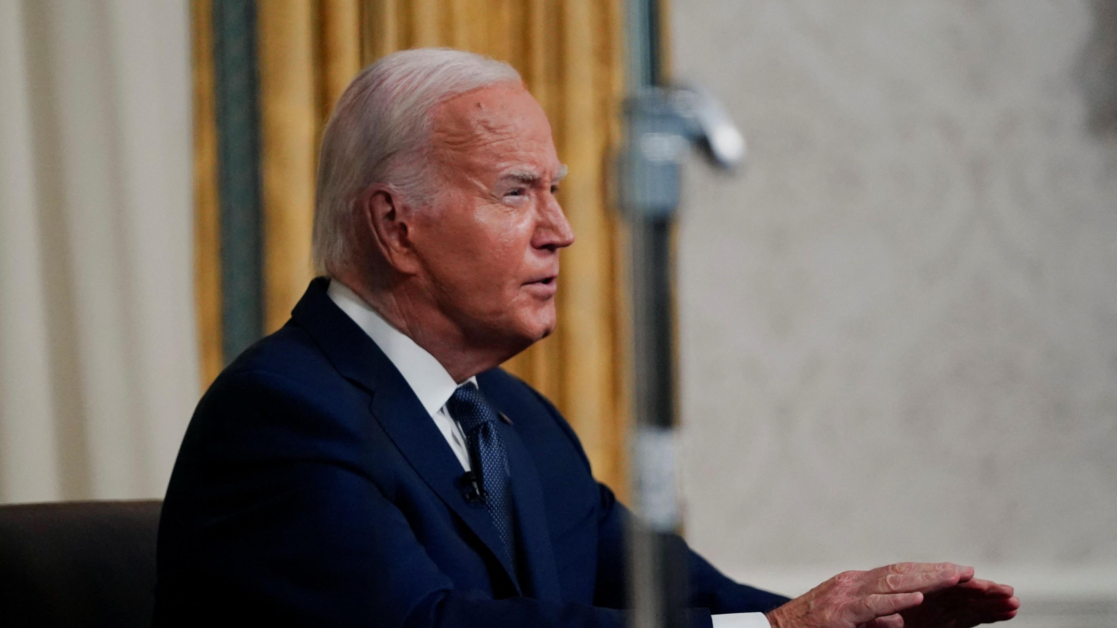 Joe Biden making his address in the Oval Office