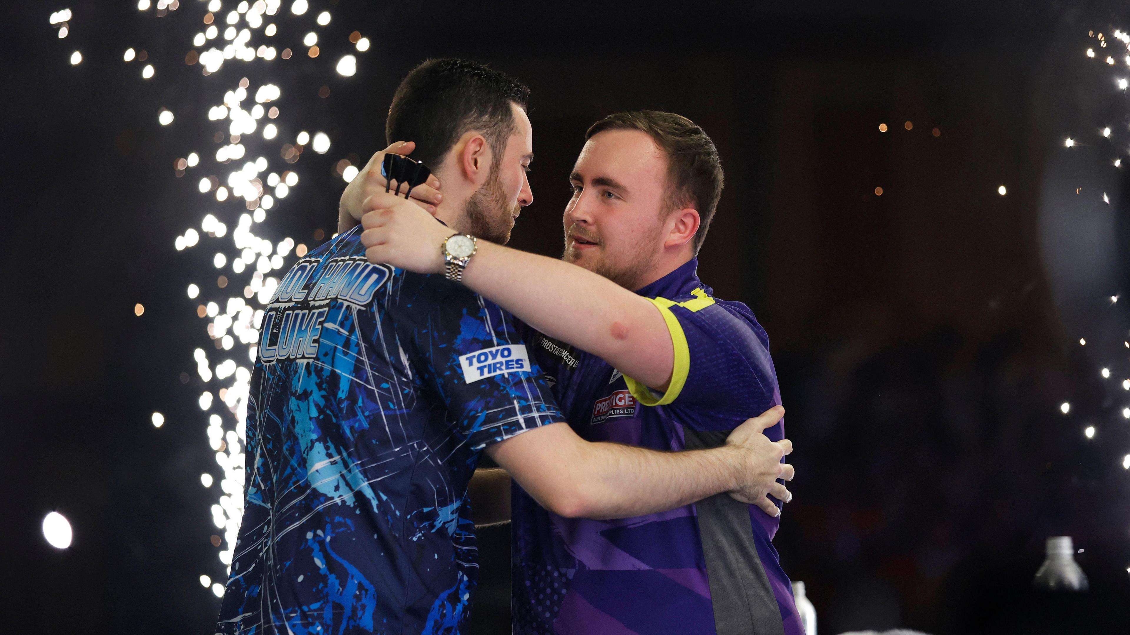Luke Littler and Luke Humphries embrace after the 2024 World Darts Championship final which the latter won