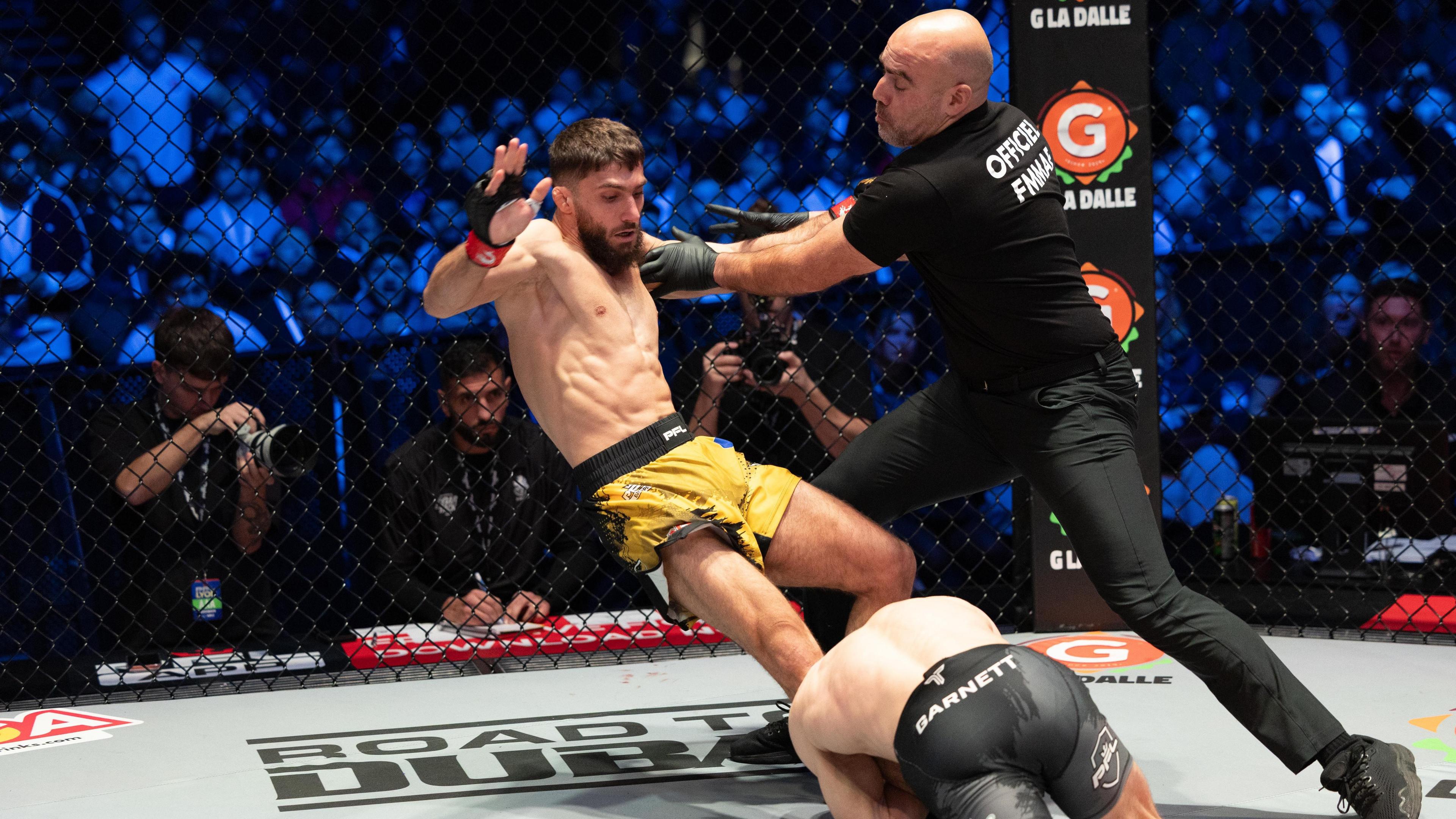 Dean Garnett in action against Baris Adiguzel