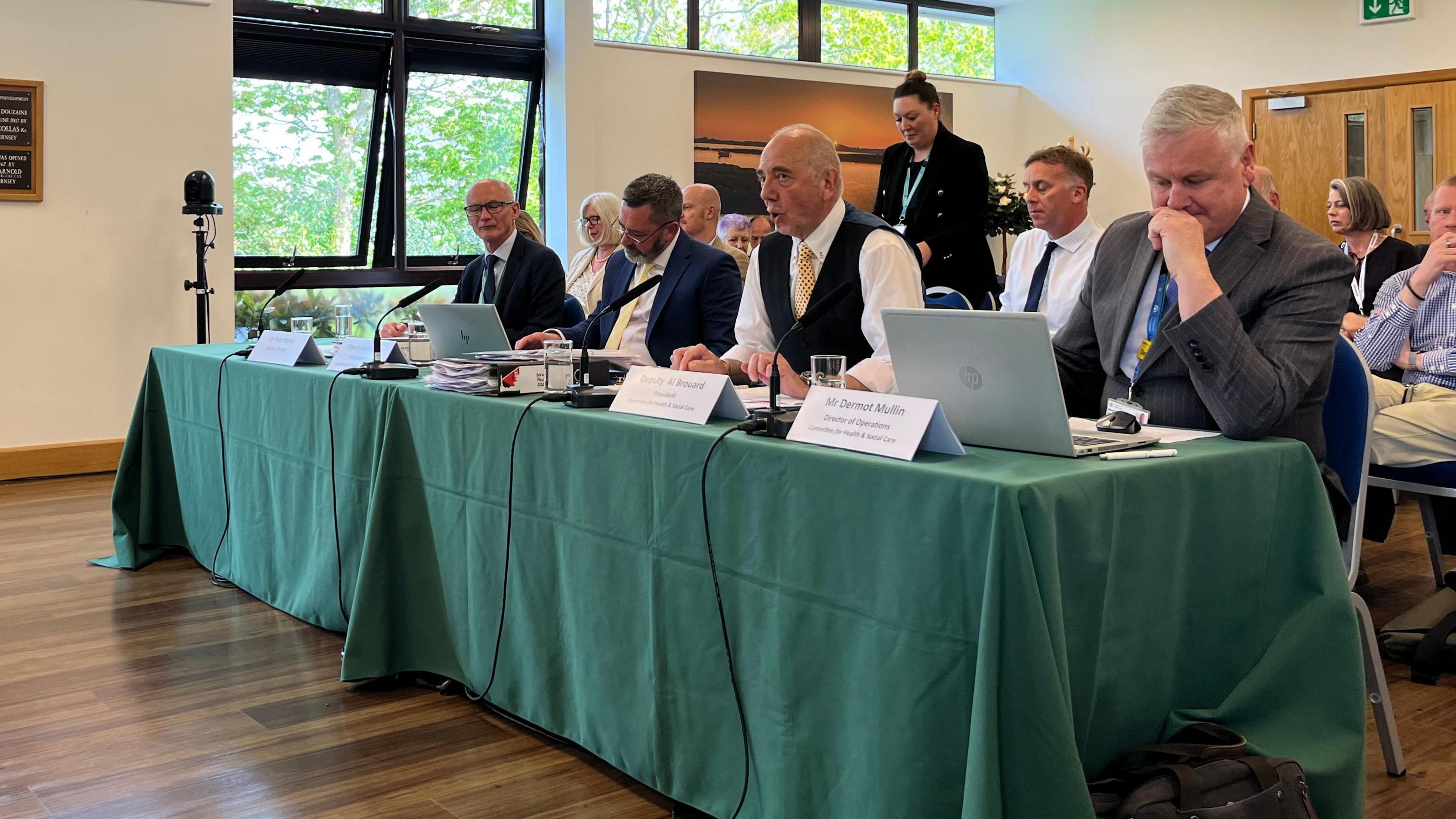 Members of Guernsey's Health and Social Care Committee in front of a scrutiny panel