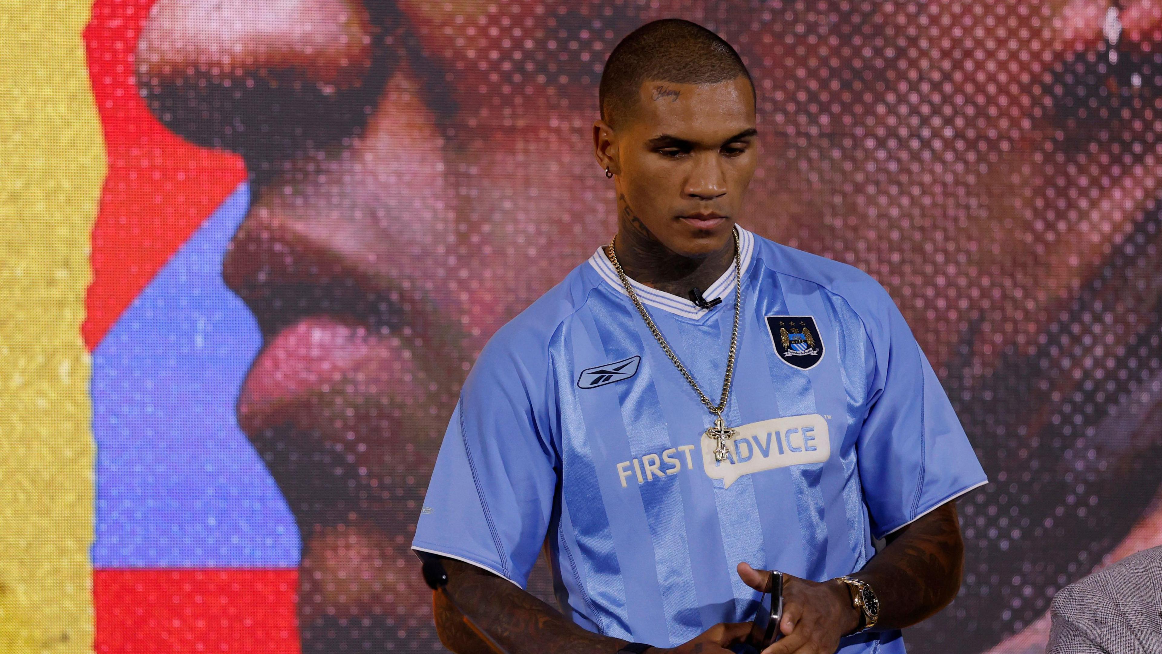 Conor Benn in a Manchester City top