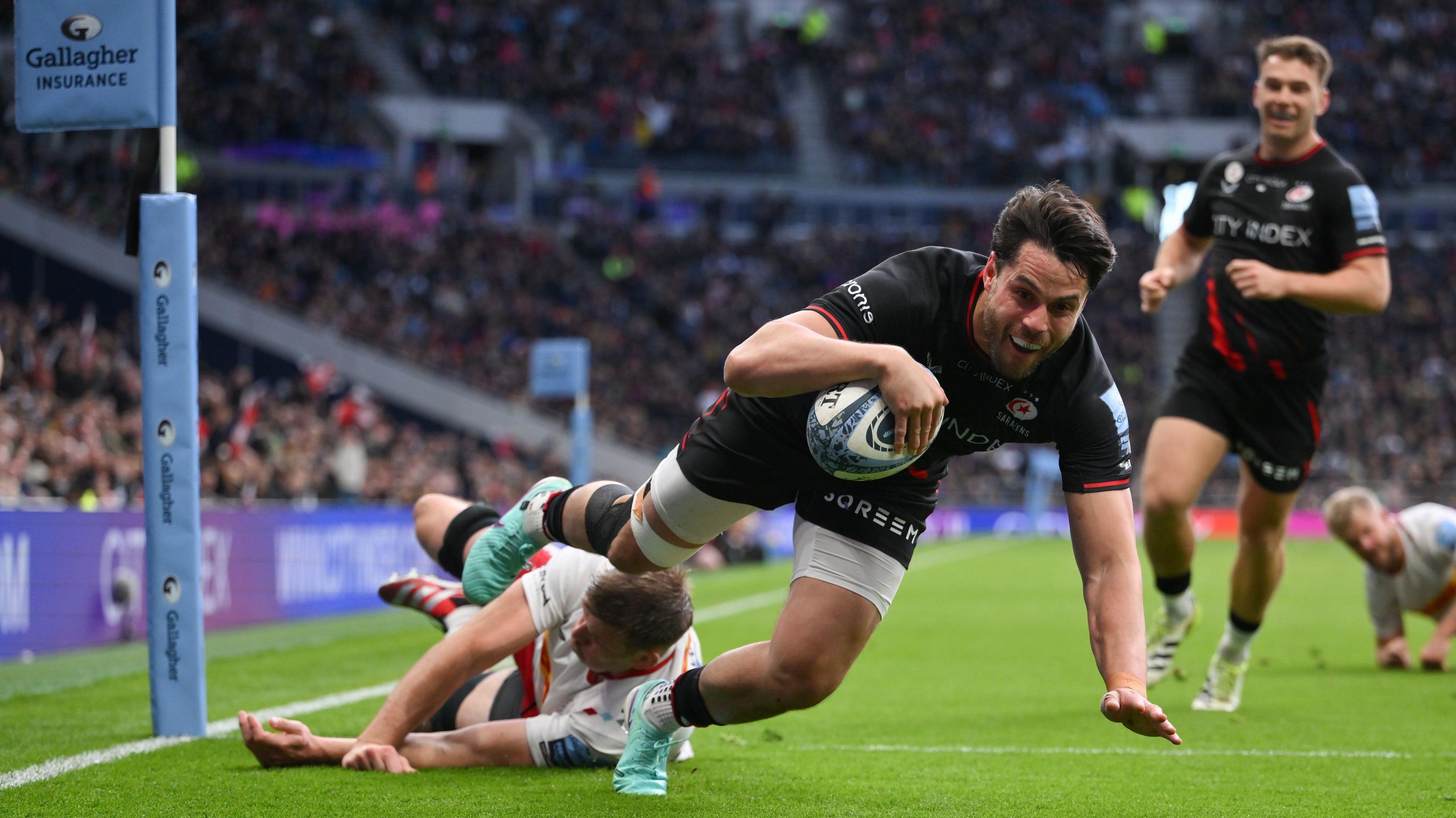 Sean Maitland dives over the line to score a try against Harlequins at the Tottenham Hotspur Stadium