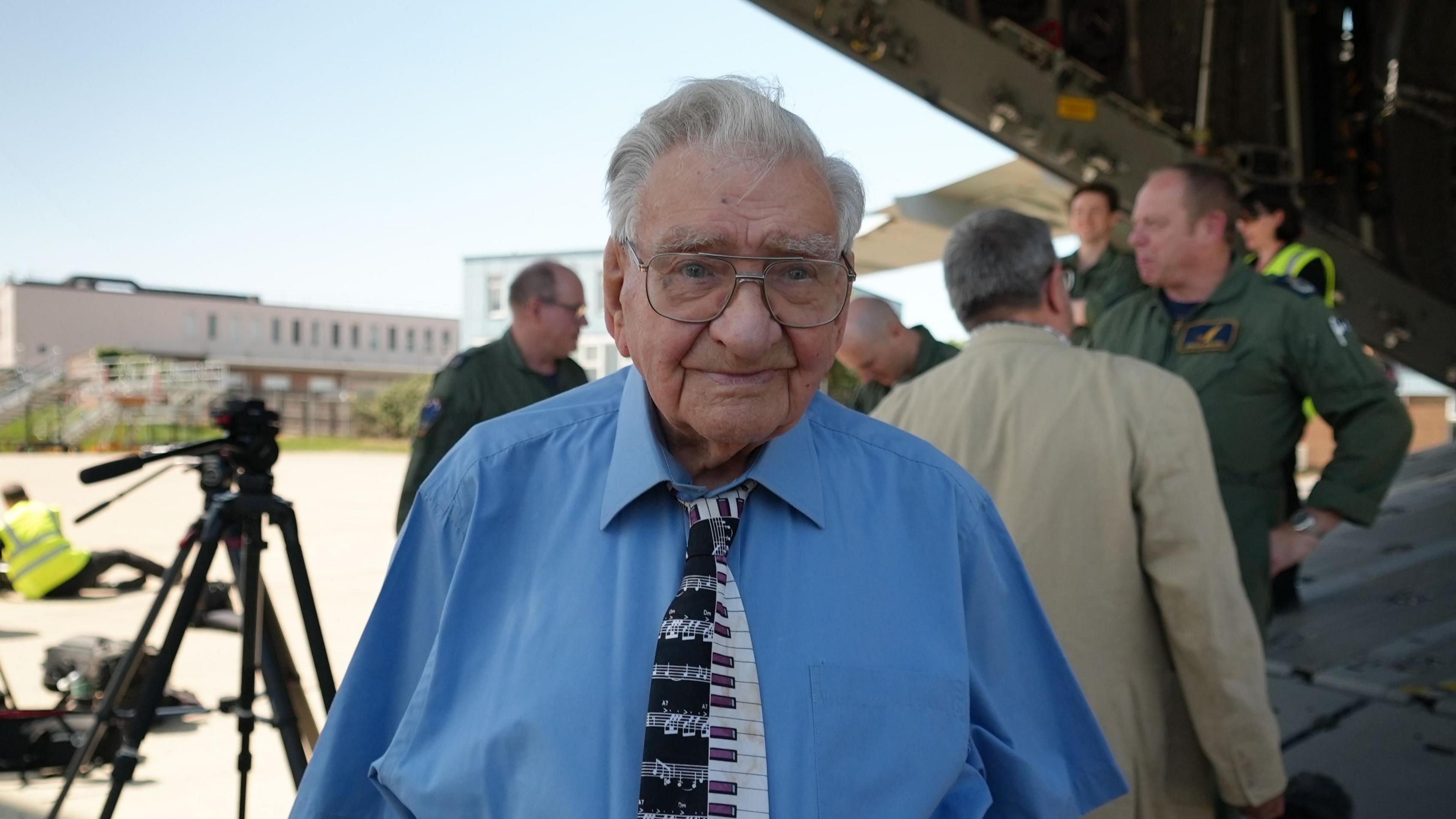 Denis Bishop stood outside the hangar bay of an A400 aircraft.