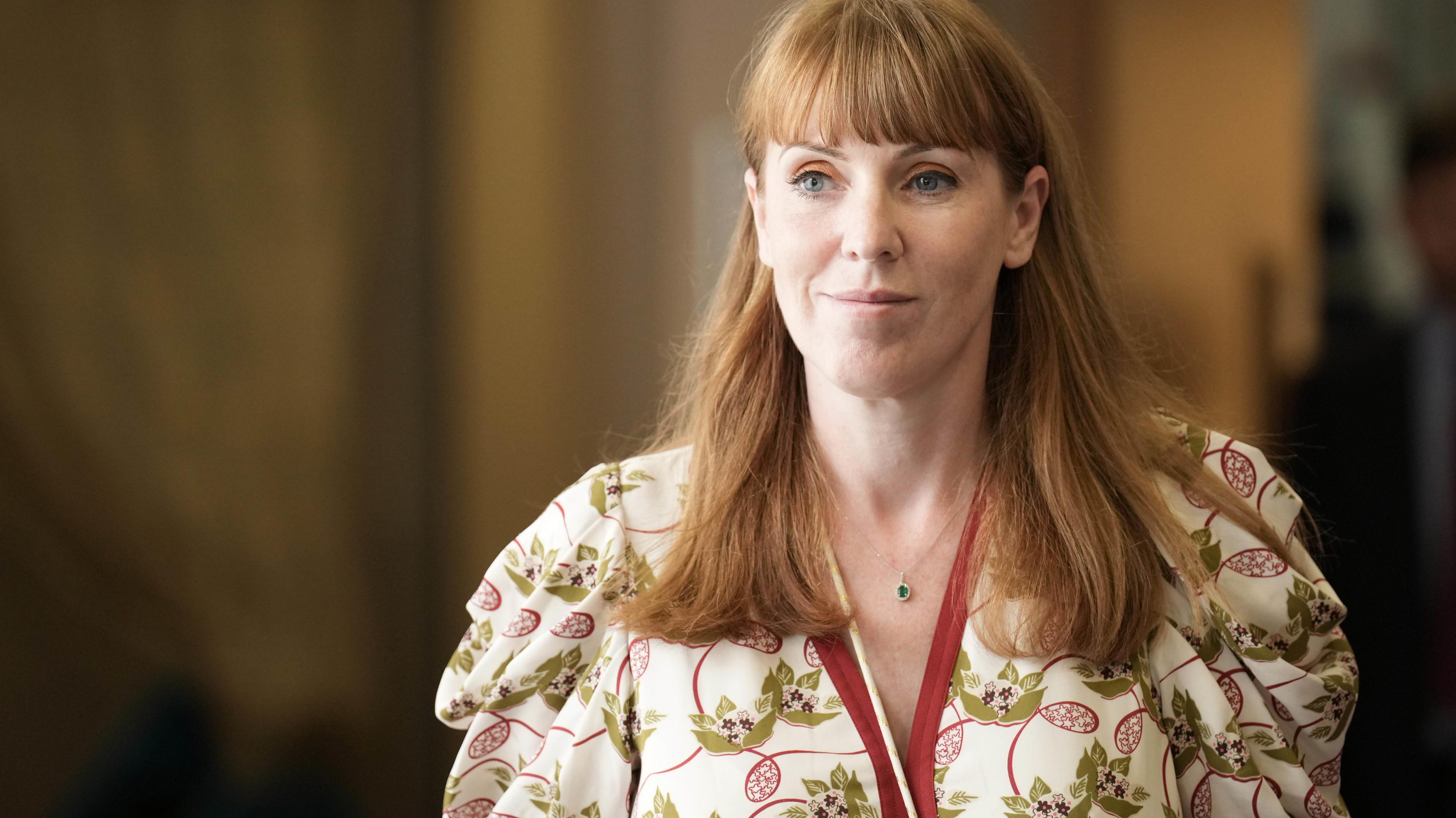 Deputy Prime Minister Angela Rayner wearing a floral dress and a pendant necklace