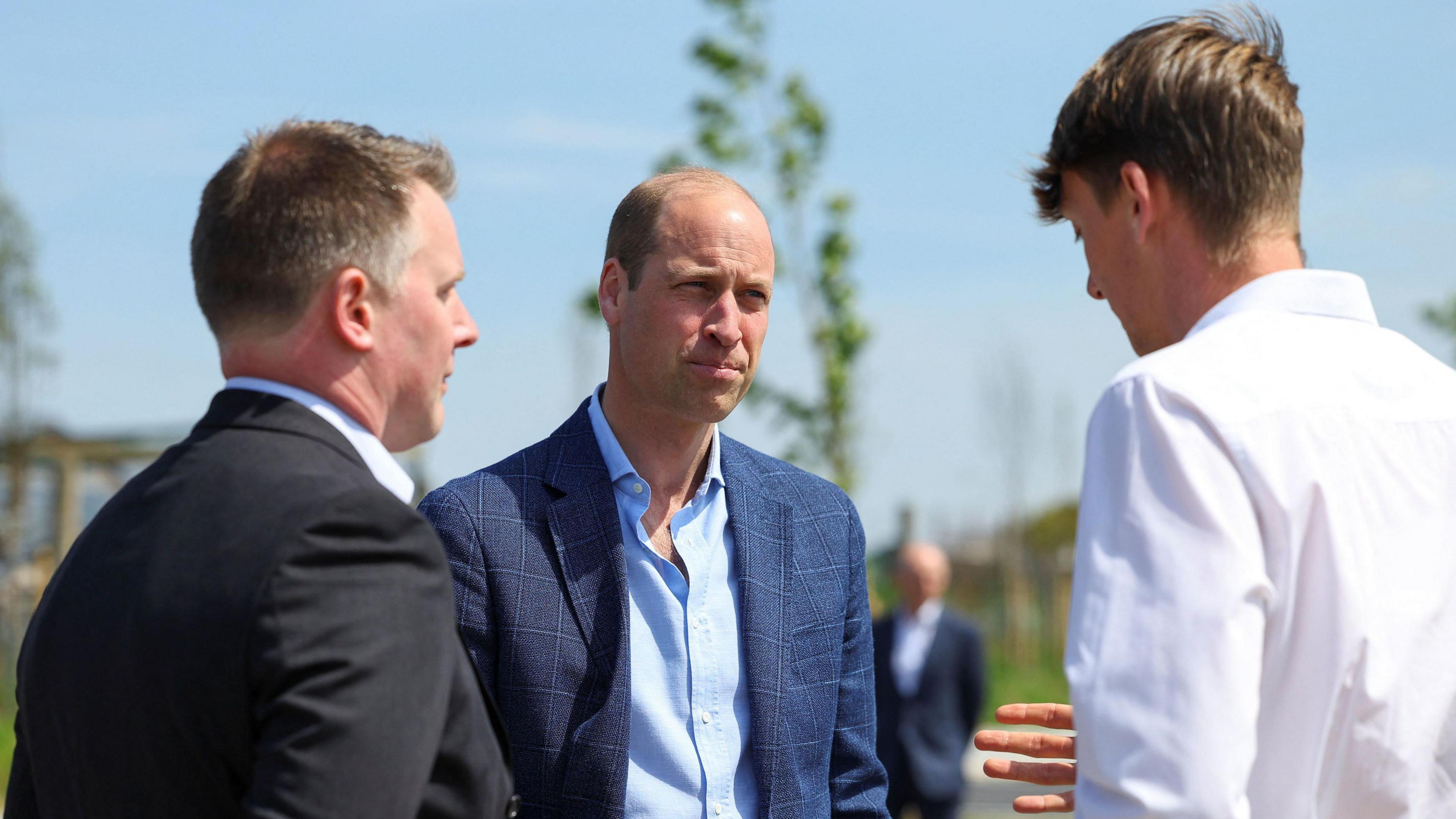 Prince William speaking to people in Nansledan