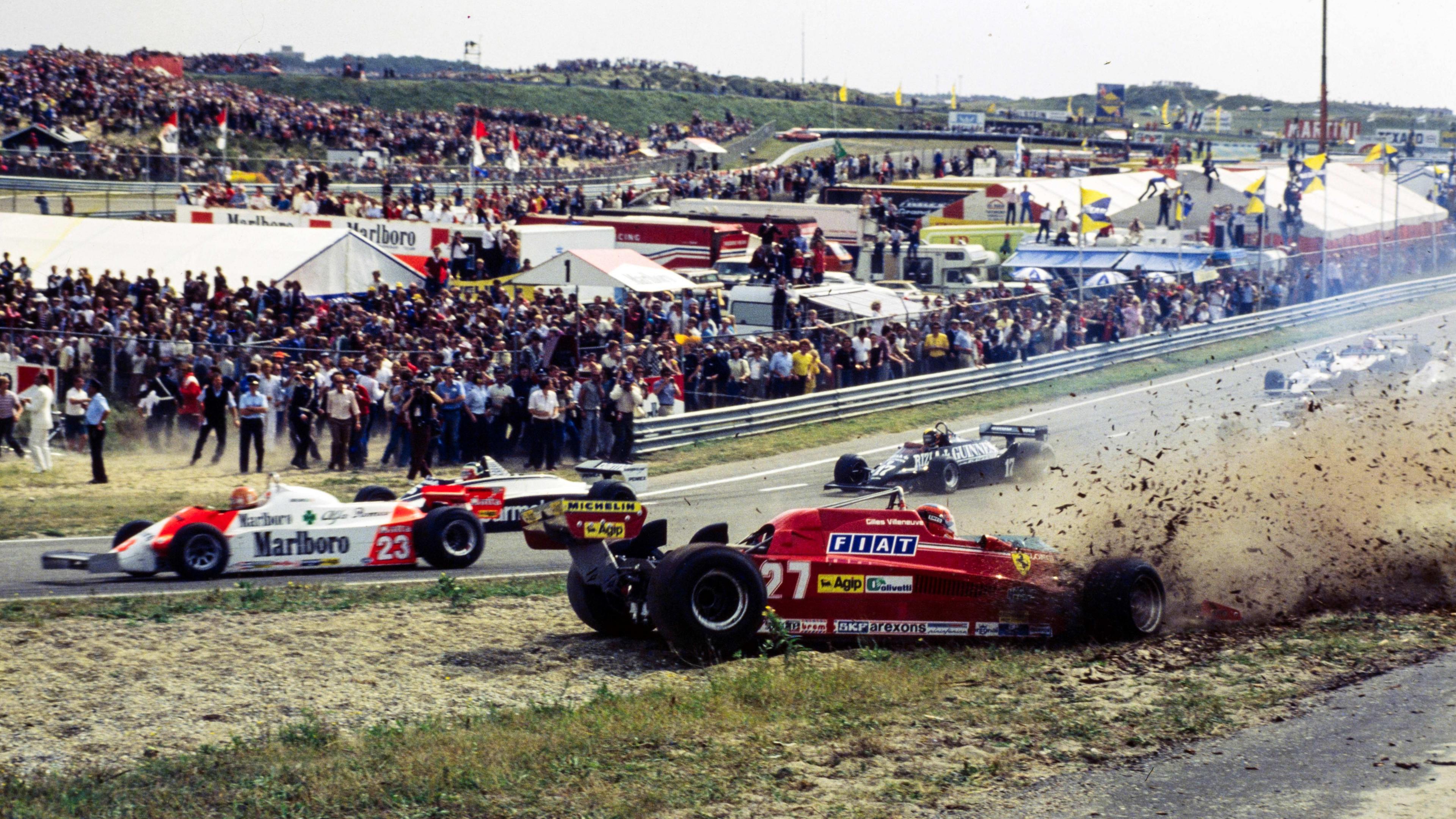 Ferrari's Gilles Vileneuve goes off at Tarzan during the 1981 Dutch Grand Prix, throwing dirt and dust into the air
