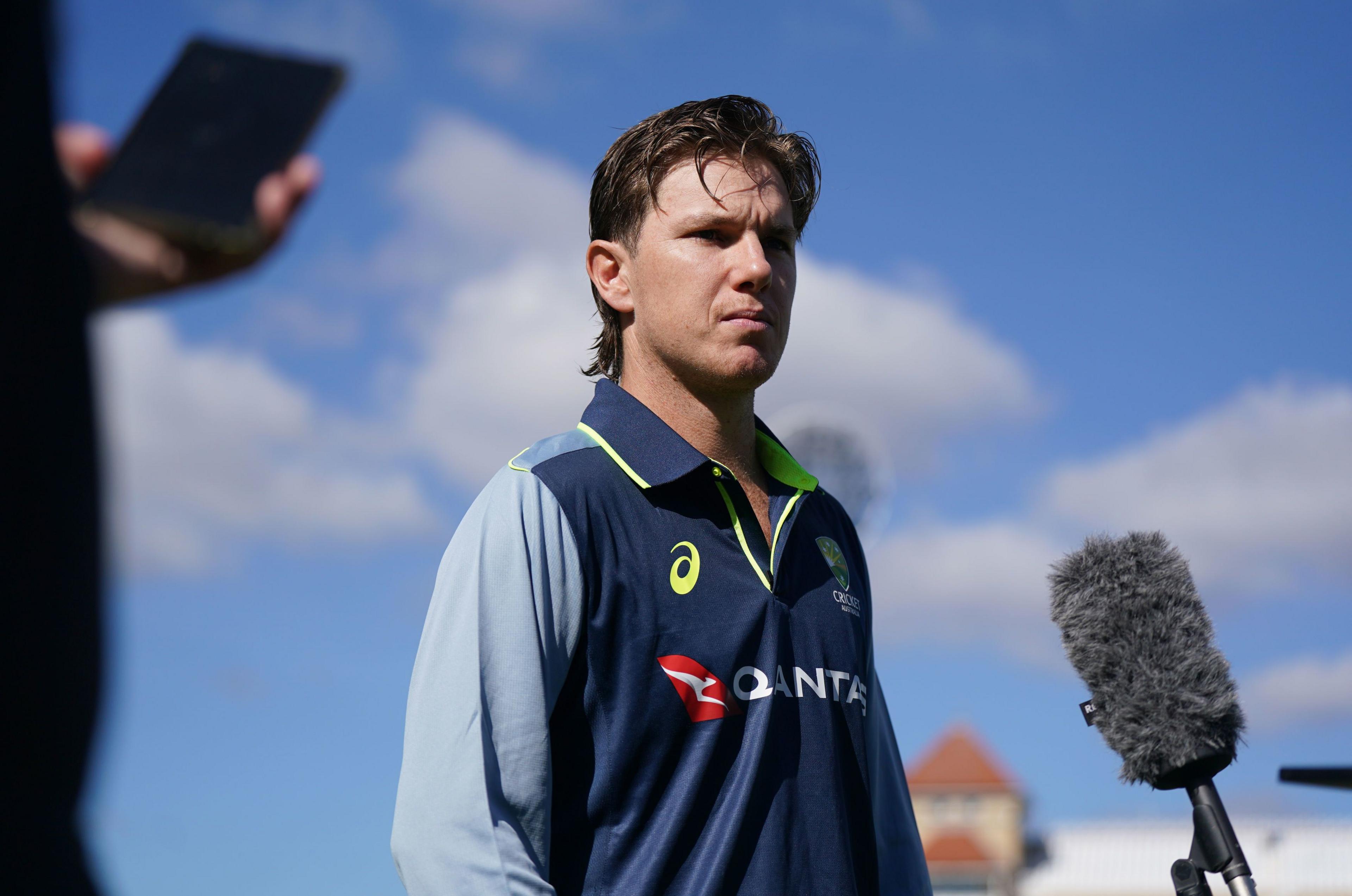 Adam Zampa talks to reporters