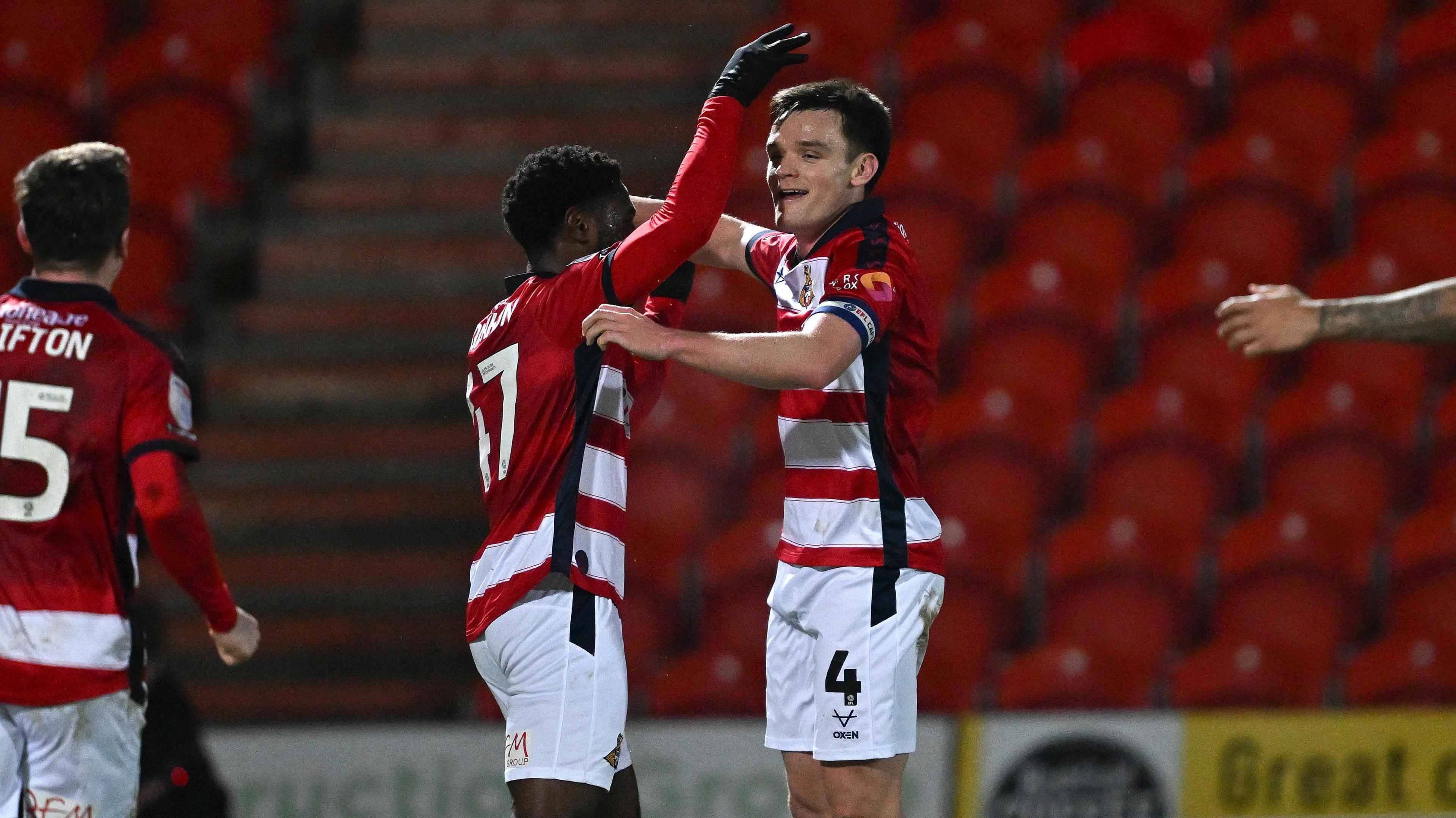 Owen Bailey celebrates his goal for Doncaster