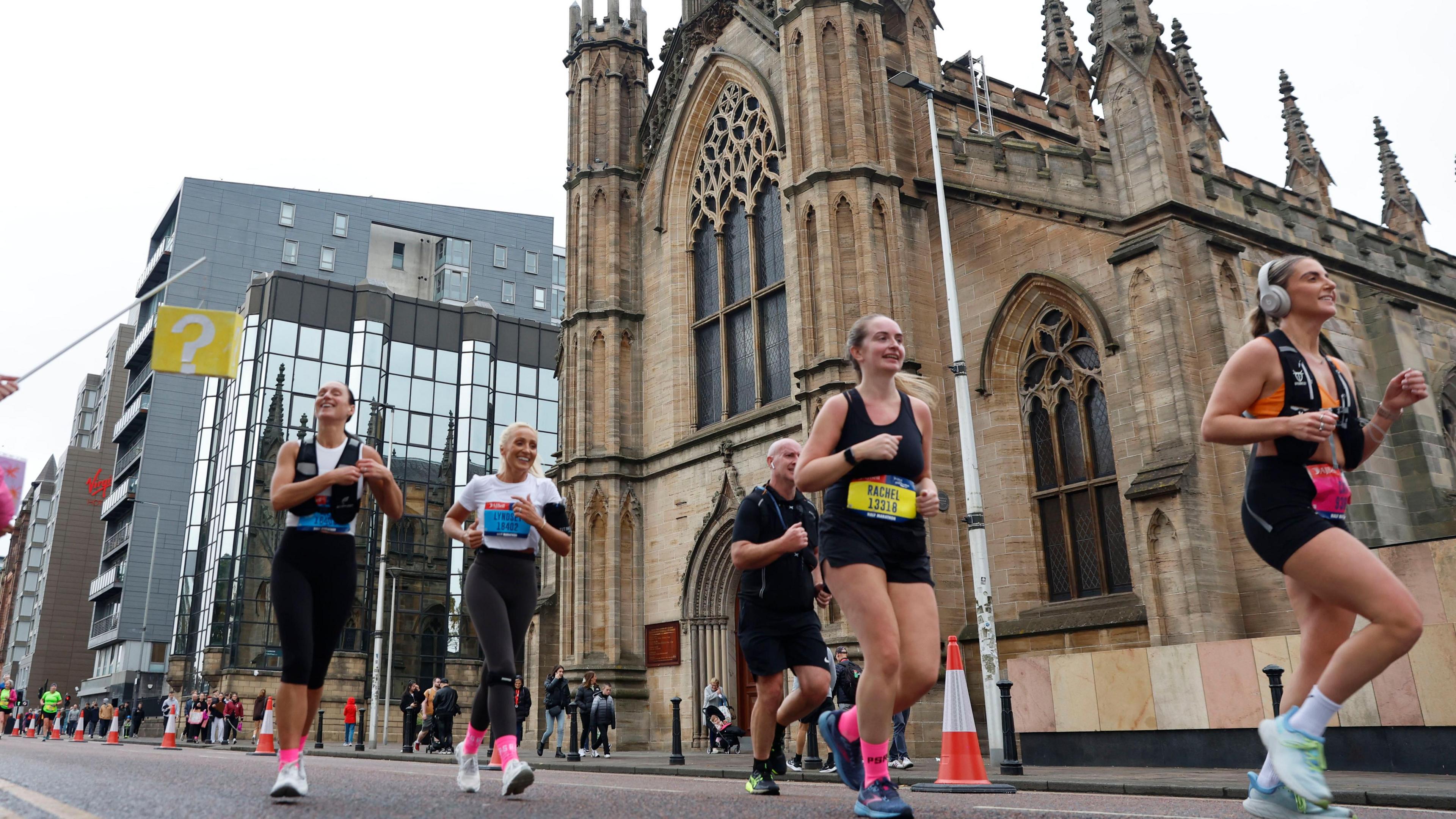 Runners going through the streets of Glasgow