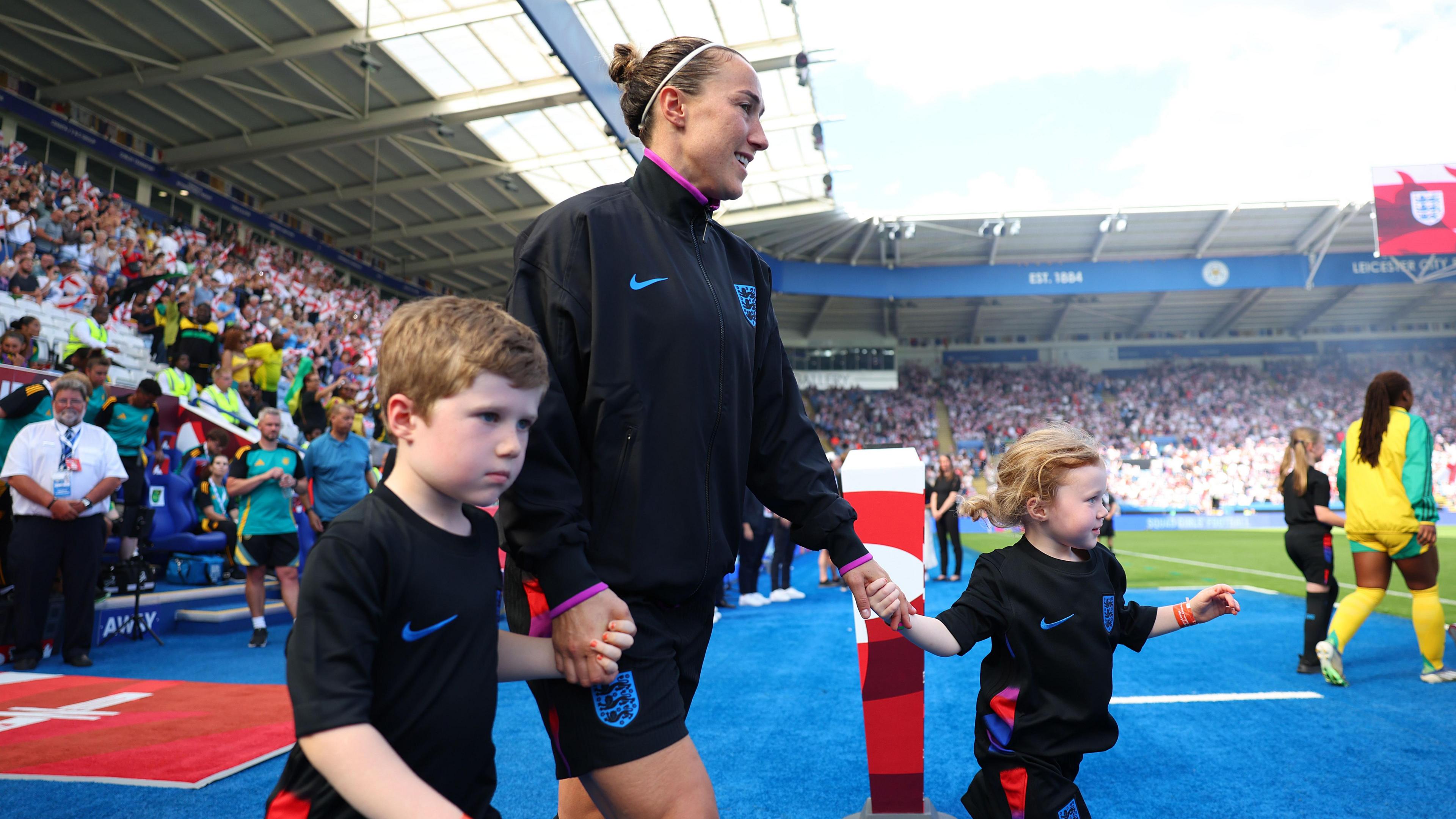 Lucy Bronze with her niece and nephew